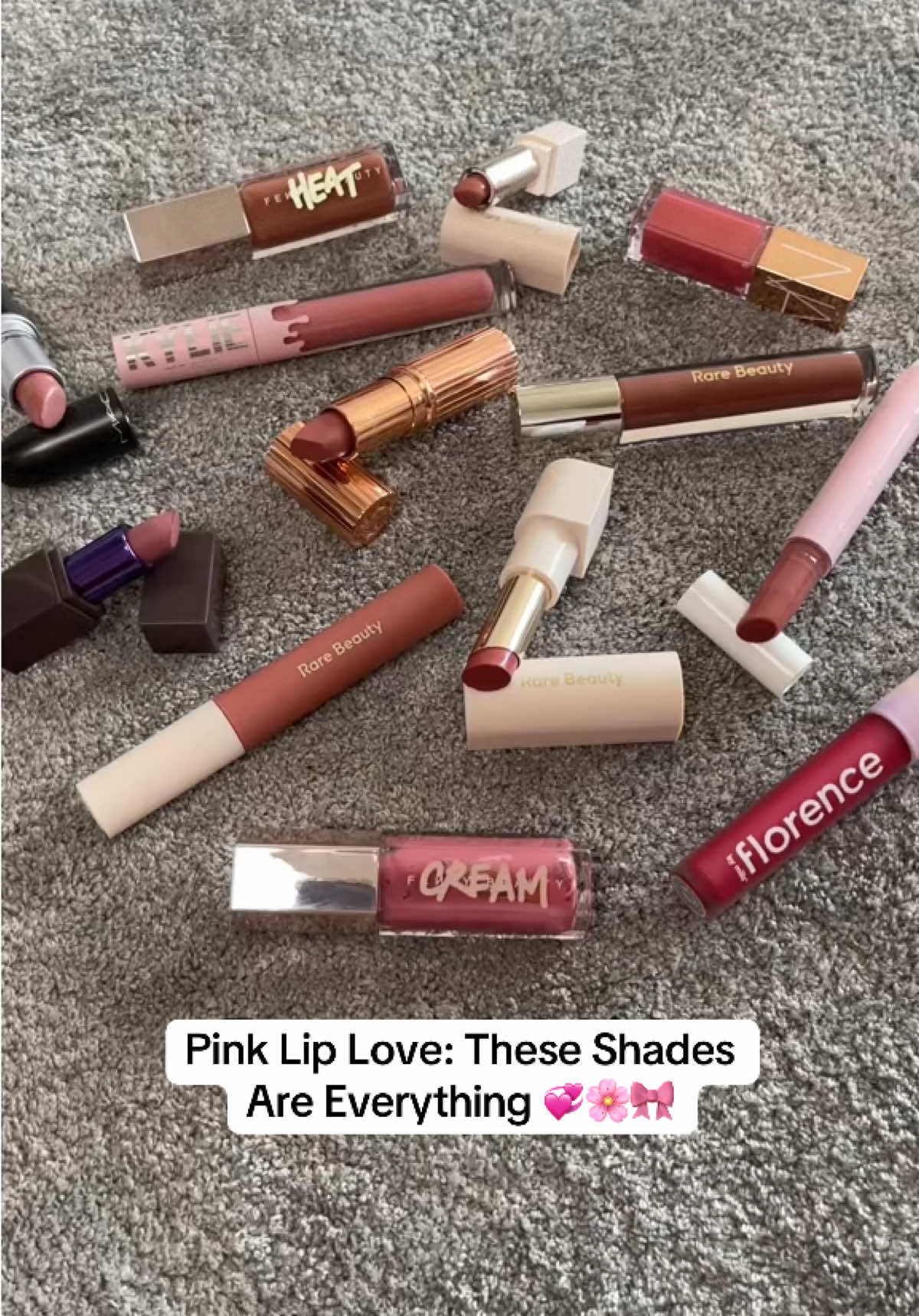 Pink lip products are my ultimate obsession 💗🎀 What’s your fav pink lip gloss? 💞 One would argue that you can never have enough From soft nudes to bold fuchsias, these are my go-to shades for every mood 🎀  @Rare Beauty @tarte cosmetics @Charlotte Tilbury @Kylie Jenner @urban decay @florence by mills @NARS Cosmetics @maccosmetics  #pinklipproducts #lipproducts  #pinklipgloss #lipglosses #glossylips #lipbalm #beauty #girlythings #lipgloss #lipstick #lipoil #lippies #gloss #glowy  #mauvelipcombo #glossybalm  #Makeup #collection
