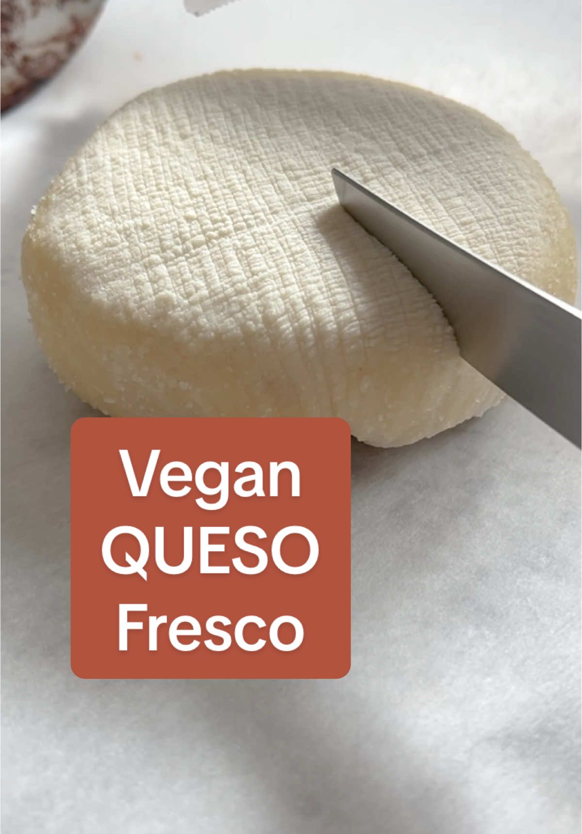 Let me change your mind about vegan cheese. This is my macadamia nut queso fresco. The texture is light and easily spreadable or you can bake it and crumble it over your favorite Mexican dishes. There’s a version with almonds in my new cookbook Comida Casera, available for pre-order now!9 #veganqueso #quesofresco  Queso Fresco * 1 cup Macadamia nuts raw * 1 clove Garlic peeled * 1 tsp. Lime juice fresh * 2 tbsp. Olive or vegetable oil * 2 tsp. Nutritional yeast * ½ tsp. Salt * 1 piece cheesecloth Instructions * For the queso fresco: soak the macadamias in water at room temperature overnight. The following day, drain the nuts and place in a food processor with the garlic, lime juice, oil, nutritional yeast, and salt.  * Process 1-2 minutes or until the nuts turn into a paste that resembles ricotta cheese. If necessary you can add 1 tbsp. of water to reach the ricotta consistency. Taste and adjust seasoning.  * Wet a large piece of cheesecloth, approximately 12” X 12”. Place the paste in the center and a form it into a ball by gathering the edges of the cheesecloth around the cheese. * Twist the top edges of the cheesecloth to tighten, give shape, and get rid of excess water in the cheese. Place the cheese bundle on a plate and let sit overnight in the refrigerator. * The next day unwrap your cheese and serve. * If you want the cheese to crumble, bake at 325F for 7 minutes, flip the cheese and bake for 8 more minutes.