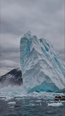 Glacier collapses near a tourist boat in Greenland. #glacier #glacierlagoon #glaciernationalpark 