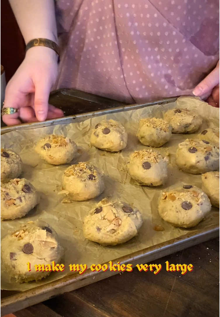 This is the BEST choco chunk cookie recipe and I hope you enjoy it! Ingredients: 1c Butter 1c Brown Sugar 1/2c White Sugar 2 eggs 1tsp Vanilla 1tsp Baking Soda 1tsp Baking Powder 1tsp Salt 2 1/4c Flour Chocolate Chips/Chunks Toffee Bits Freeze for 20min before baking at 350d F until golden brown and done (12-18min depending on size of cookie) Follow @Karn_from_the_copperspoon for behind the scenes content and exclusive Karn vids!!!! Follow along to join The CopperSpoon Family and learn to cook like a hobbit! All of the utensils and cookware used can either be found in my Amazon storefront or were thrifted locally! (🔗 to storefront in my baiouyu) We are on all social media! To follow me on your favorites check out the 🔗 in my b👁️o! We have merch!!!! Check it out at the 🔗 in my baiouyu! For full ingredient lists and extended content check out my pay🌳on! #cookie #food #baking #tavern #cozy #chocolate #hobbit #cottagecore #fyp
