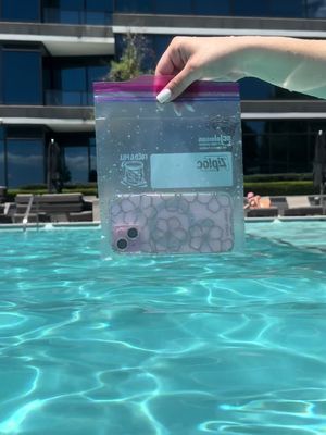 Text, scroll and snap pictures in the sand or underwater with the Waterproof Floating Pouch.