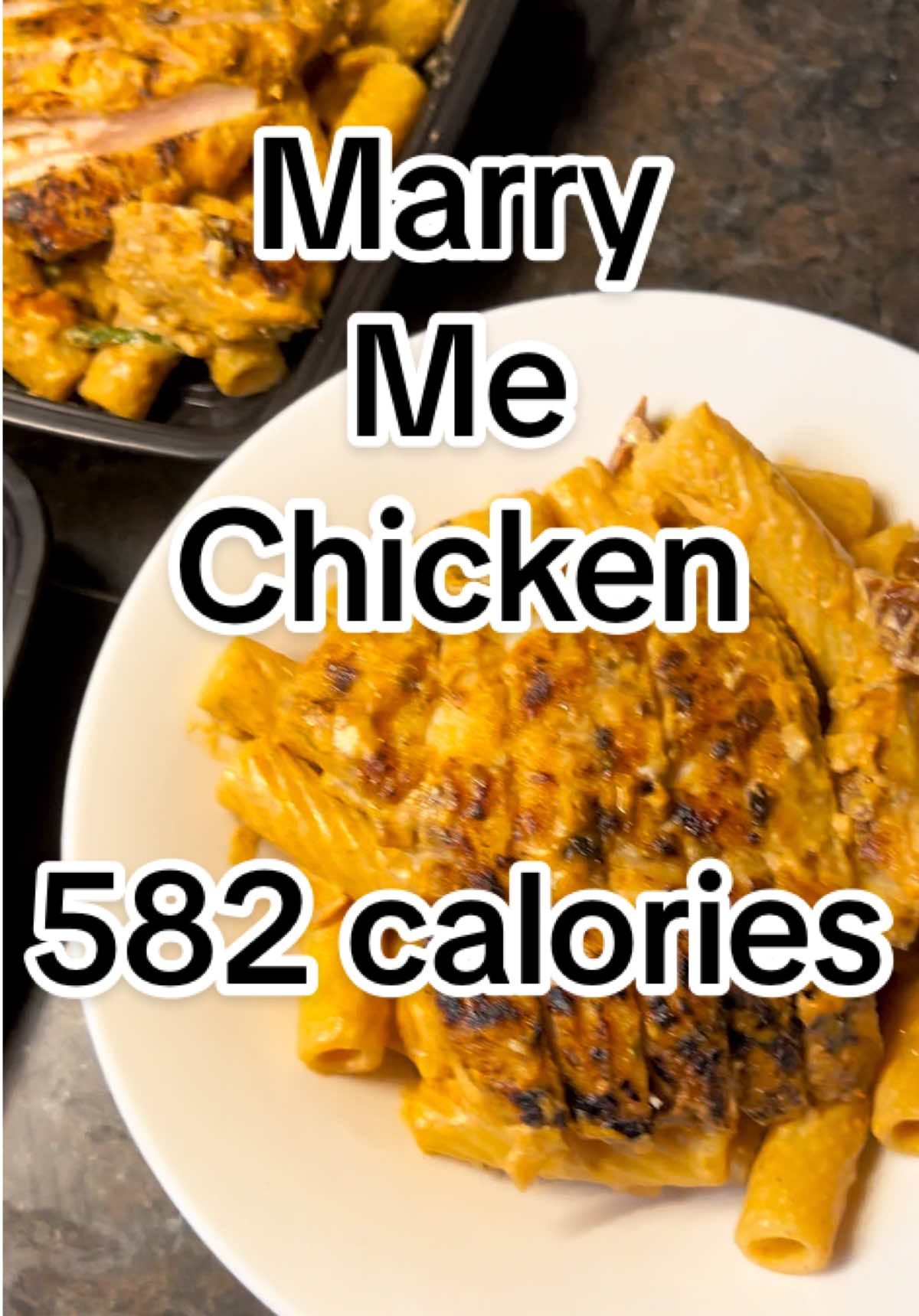 Marry Me Chicken Pasta 🍗🍝  Serves 4 - 582 calories per portion (55g C / 14g F / 53g P) For more recipes like this one check out my meal plans with weekly released recipes, all under 600 calories, perfect for weight loss. Weekly shopping list also included! Currently 60 full written recipes on there and 5 more added every week! Come and join the community!! Ingredients 260g uncooked dry pasta 1/2 tbsp sun-dried tomato oil 1/2 tbsp light butter 1 brown onion 20g tomato puree 80g drained sun-dried tomatoes 60g parmigiano reggiano 400ml chicken stock (I used one chicken oxo cube) 200g reduced fat cream cheese 1/2 tsp smoked paprika 1/2 tsp oregano 100ml reserved pasta water Large handful of fresh chopped basil Ingredients - for the chicken 550g raw chicken breast 15g plain flour (more on the plate, but this was the amount actually coating the chicken) 1/2 tsp salt 1/2 tsp pepper 1 tsp oregano 1 tsp garlic granules 1/2 tsp onion granules 1/2 tsp smoked paprika #EasyRecipe #healthyrecipes #healthyrecipeideas #mealprep #caloriedeficitmeal #healthy #marrymechicken #chicken 