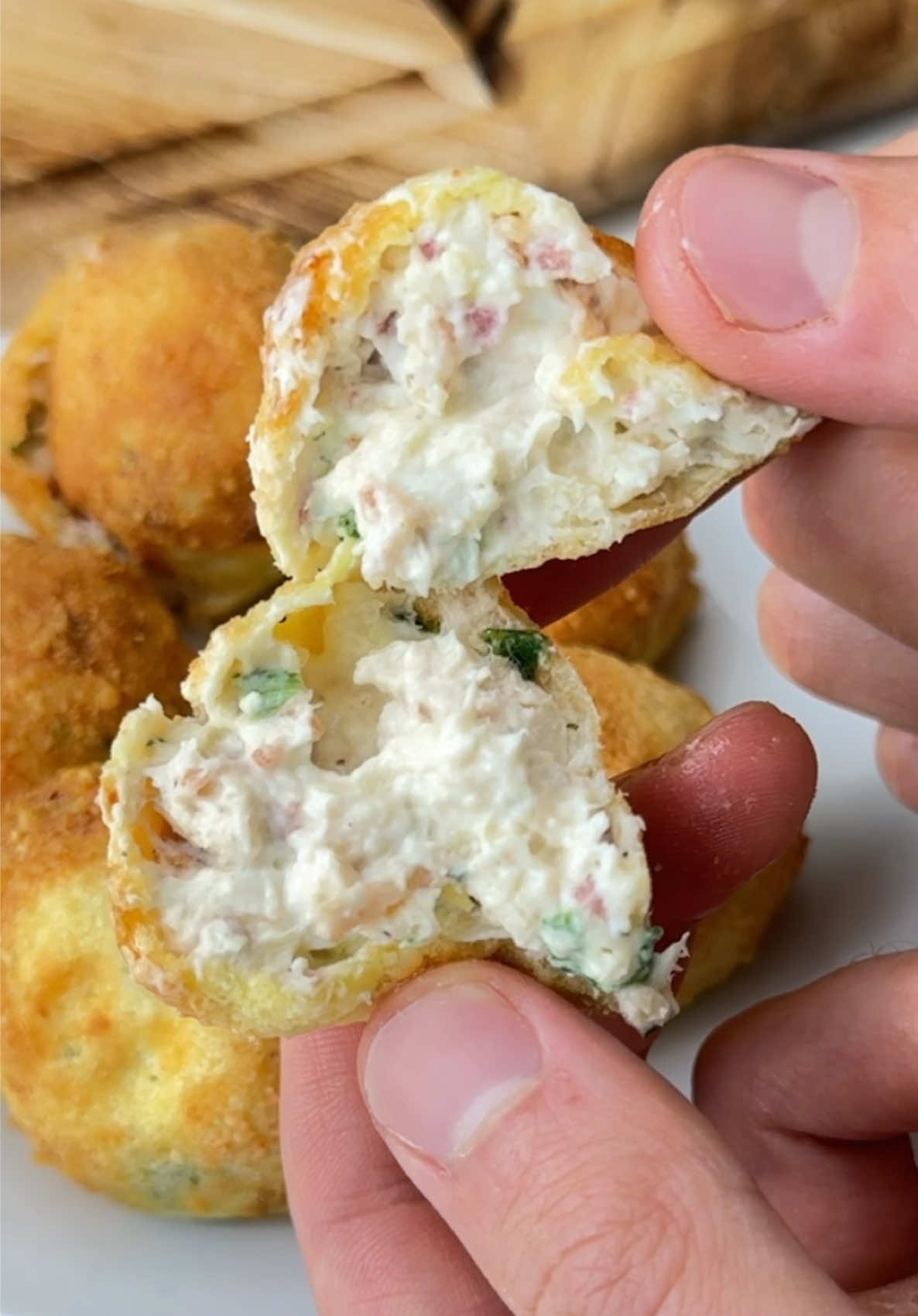 Say “YUM” if you would eat these Chicken Bacon Ranch Bites 😋🐔🥓 How to make them: Mix 1 cup chopped chicken with 4 oz cream cheese, 4 slices of chopped bacon and 1/2 packet of ranch seasoning. Roll into balls, freeze for an hour or two. Coat in egg wash, Parmesan and air fry @ 400F for 6-8 mins. Enjoy!