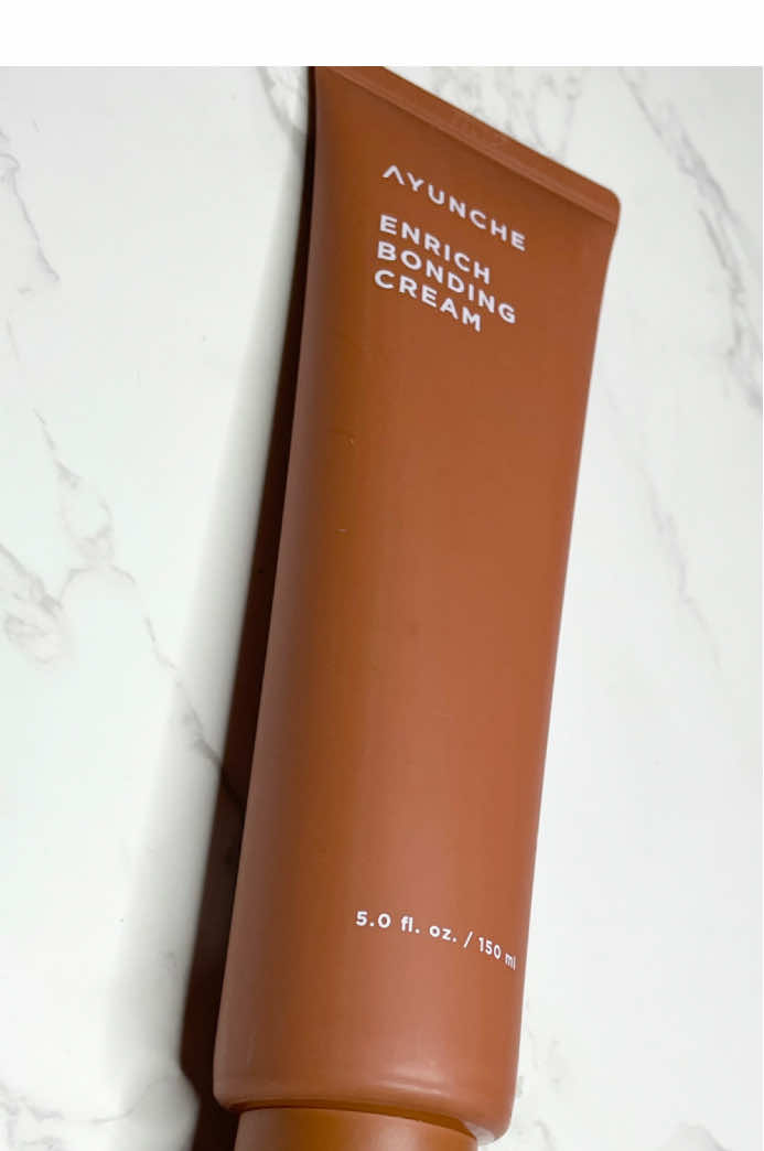 I received this product for free from @ayunche_us, @Picky Shop: and @Picky Shop: in exchange for my honest review. The AYUNCHE Enrich Bonding Cream not only nourishes and repairs damage but also adds a fantastic softness that I've been longing for. It's packed with nutrient-dense ingredients like Vita Complex, macadamia seed oil, grape seed oil, and camellia seed oil, which make my hair feel incredibly healthy. What I love most is its ability to protect against heat damage, allowing me to style my hair without worry. Plus, it's versatile — I can use it before OR after drying my hair, and it effectively smooths out frizz, leaving my hair looking sleek and manageable. Overall, it's a game-changer for anyone struggling with damaged hair! #pickyreview #gopicky #pickyxayunche #ayunche #reels #beautyblogger #igwriters #hairmask #hairtreatment #haircare #conditioner #explore #hairstyling #frizzyhair #seedoils #softhair #healthyhair #bondingcream #hairrepair #heatprotection #beautyessentials #SelfCare #kbeauty #koreanbeauty #revitalize #beautycommunity #productreviews #GlowUp 