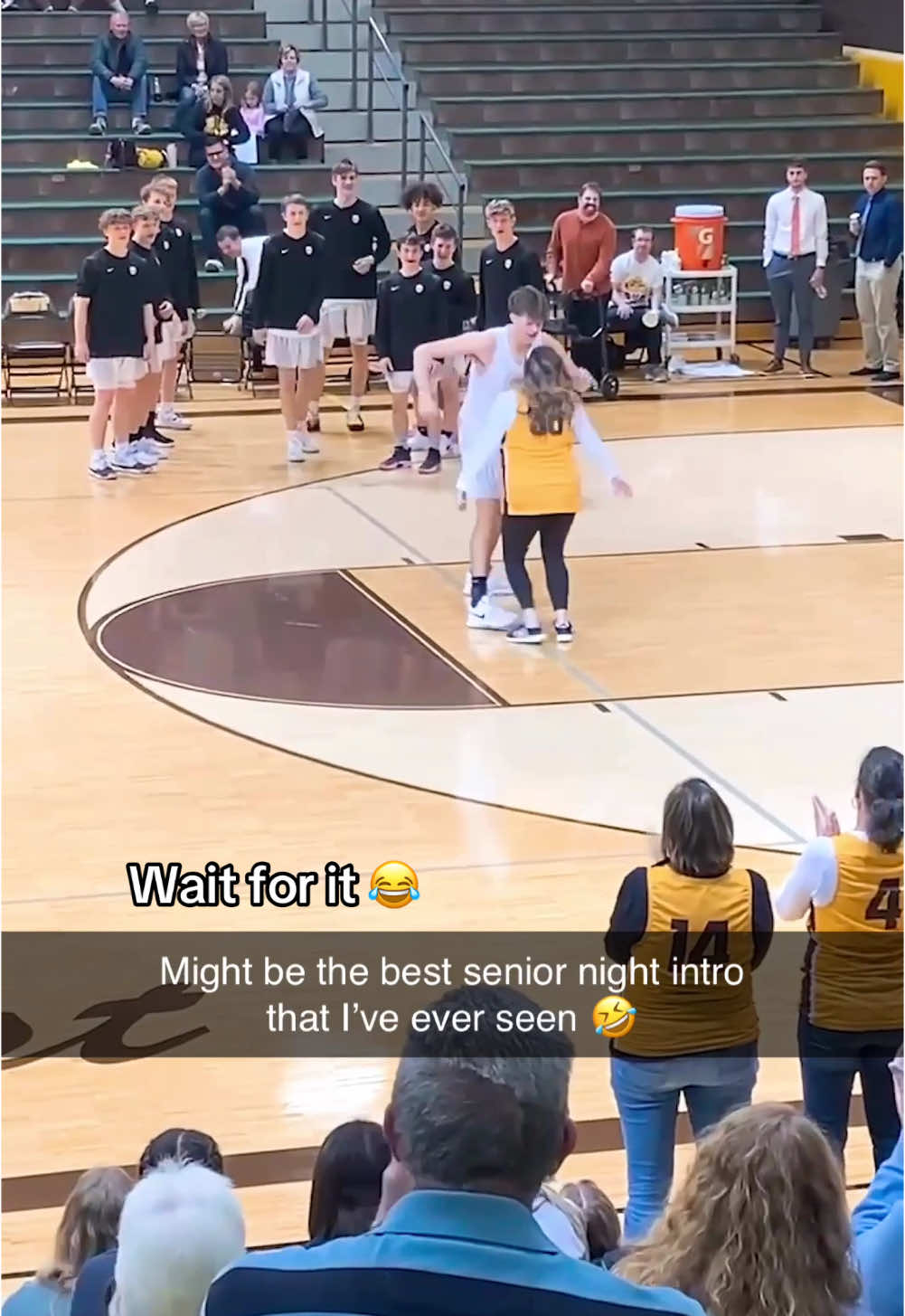 This #SeniorNight intro is elite 🤣 (via @Zeeland East Yearbook) #basketball #motherson