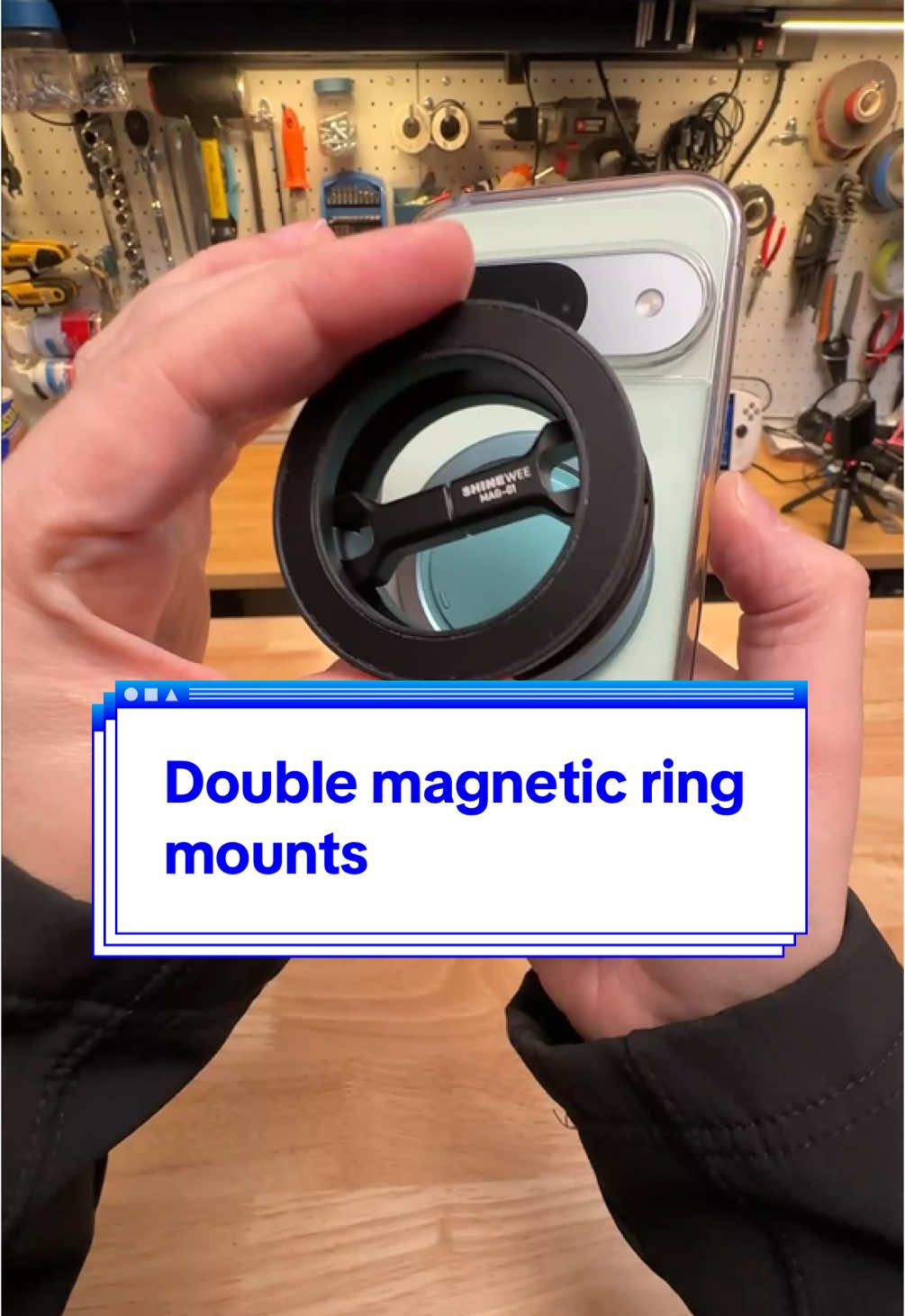 Double magnetic ring mounts are here -- letting you prop up your MagSafe-compatible phone at any angle, attach it to anything made of ferrous metal, or even stick two phones together. They typically cost around $15; the beefy one here is branded Shinewee, the flatter one comes from GK but also goes by other names. Each comes with a pair of adapters so you can use them on non-magnetic surfaces. #todayimtoyingwith #tech #techtok #magsafe #phonemount 