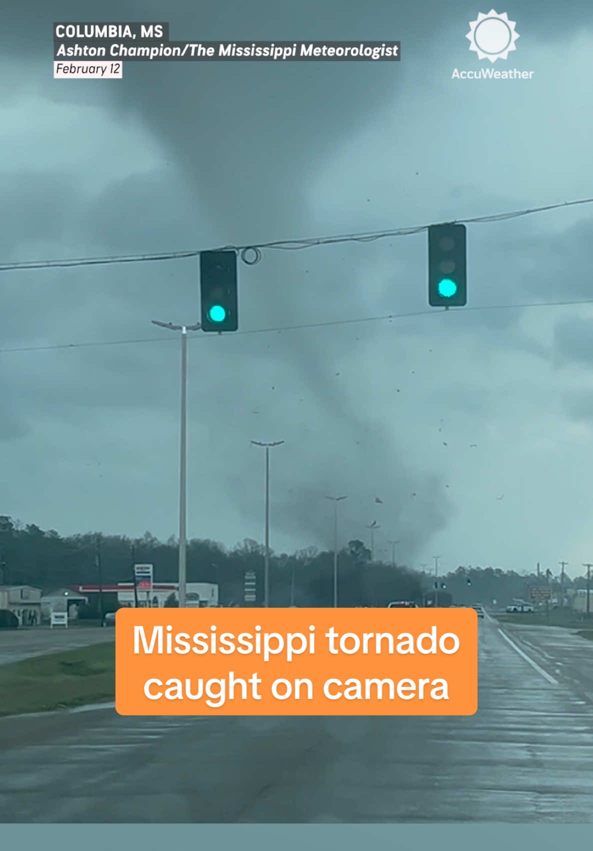 Debris can be seen being thrown into the air as a tornado tore through Columbia, Mississippi, on Wednesday afternoon. ⁣ ⁣ #tornado #mississippi #storm #stormchaser #columbiams #severeweather #caughtoncamera #weather #accuweather 