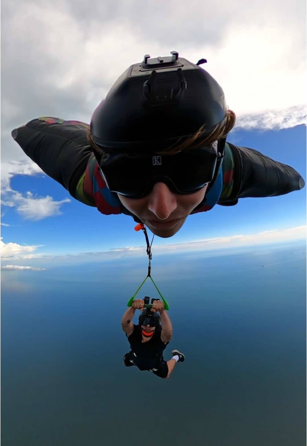 Wait for the drop 👀 @Blake Smith gave his bestie @MateoMassoni a ride through this narrow gap in Panama City in style. #gopro #gopropov #pov #wingsuit #bestie 