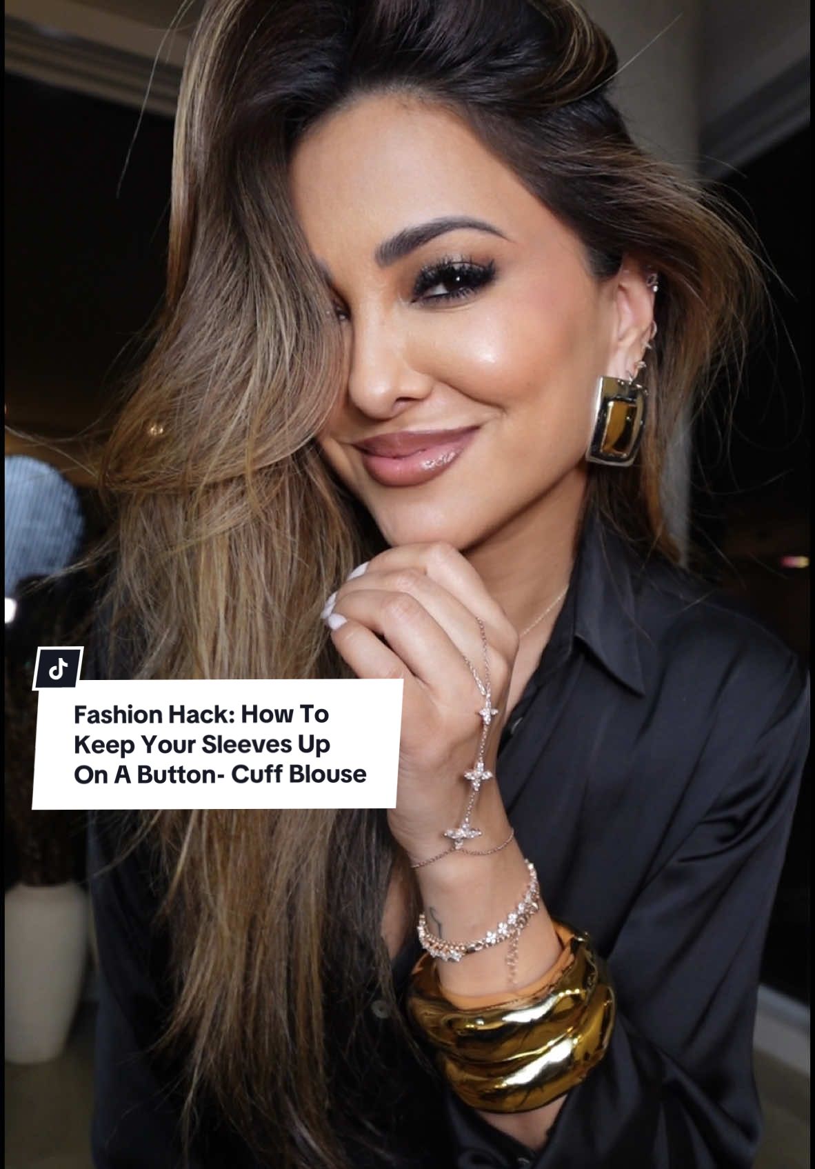 Fashion Hack: How To Keep Your Sleeves Up On A Button- Cuff Blouse✨ #grwm #fyp #styletips  Rate this #fashionhack from 1-10! This is another one of my favorite hacks I’ve learned, and it’s so easy to do!! If you love wearing satin or smooth shirts like I do, this is the best way to keep your sleeves rolled up without them falling back down.  Also, if your sleeves are too long or you want to show off your wrist jewelry, then this fashion hack is definitely for you! Memo: This hack works best when using a clear elastic band that’s a little thicker, so it doesn’t snap when lightly pulling up the sleeve.  You also don’t have to use a bobby pin, but I personally find it so much easier to do it you have one on hand 🙌🤍✨💫 TAG someone who would love this, & comment down below if you want to see more #style hacks!  Don’t forget to save this video to refer back to when you’re ready to get dressed up xo • #OOTD #styletips #outfitideas #fashionhacks #grwm #todaysoutfit #todayslook #womensfashion #foryourpage #fashiontiktok #styletok  Todays affirmation: “I am worthy of being loved, cherished and celebrated” 💫