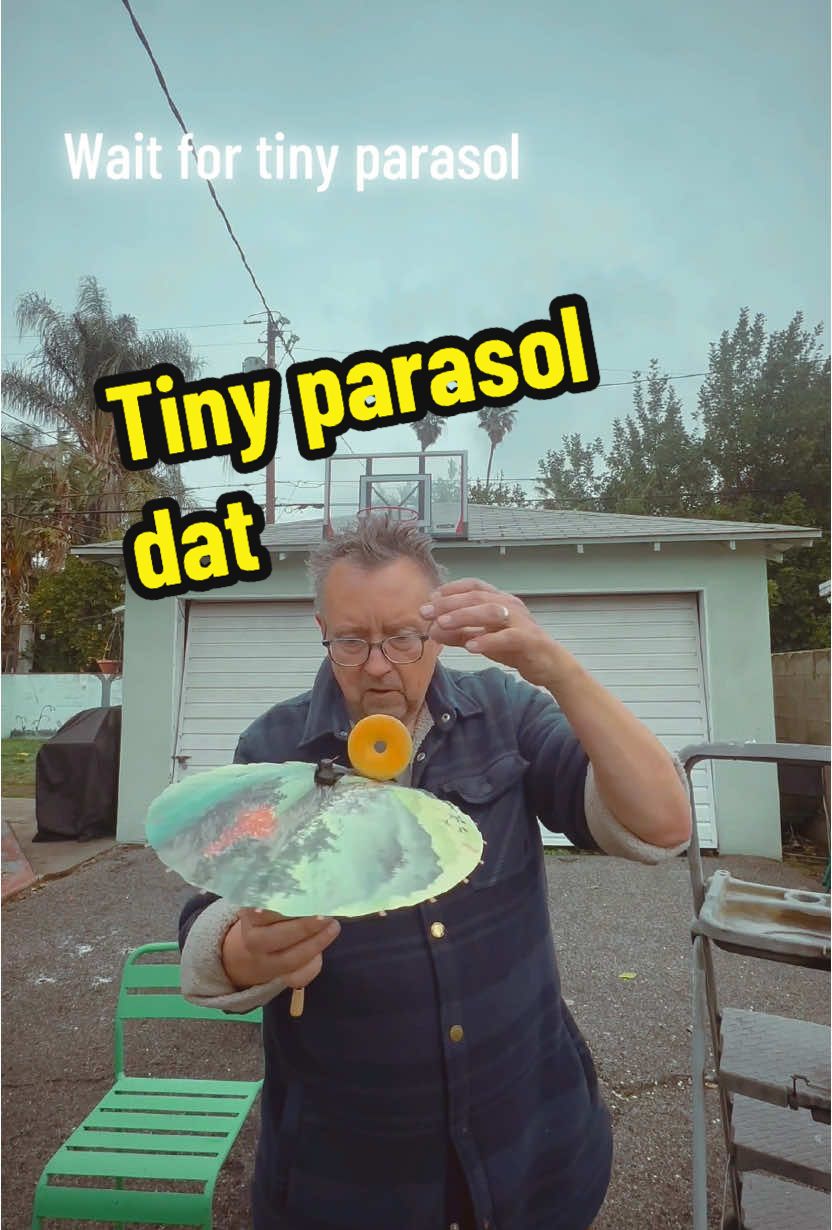 Tiny donut and tiny parasol. #tiny #things #today #parasol #donut #tricks 