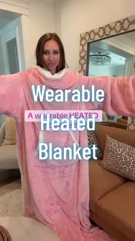 This wearable heated blanket is basically a warm hug you can live in. Designed to be worn frontwards or backwards, it has a kangaroo pocket for your hands and a built-in foot pocket to keep your toes warm. With multiple heat levels, it's perfect for lounging, working from home, or just staying cozy on chilly nights. And the best part? It’s machine washable! Flash sale won’t last long, so grab one while you can! wearable heated blanket, heated robe, cozy blanket, winter must-have, warm and cozy, soft fleece, electric blanket, home comfort #heatedblanket #blanket #blanketlife #blankets #CozyVibes #UltimateCozy
