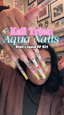 Kali Tries: AQUA NAILS 💧💧 I got my hands on @the_nailology_lab New Liquid IV Kit from @NAILDOC  Overall the kit is beginner friendly I would recommend!! Only feedback is the saline bottle did start to hurt my hand from squeezing to come out but that’s about it!! And if you do get the kit GET A NAIL ART SPOON!! lol  #aquanails #nailtutorial #explorenails #nailvlog #lanails #kalitries #liquidnails #waterglobenails #aliciathenaildoctor #sailormoonnails #valentinenails 