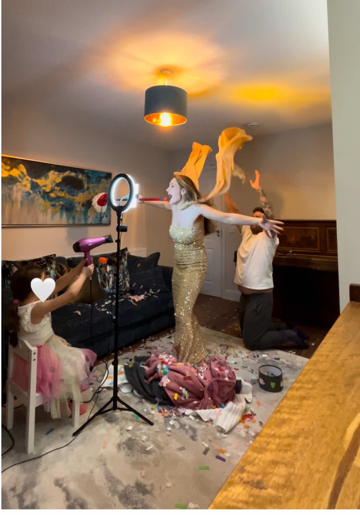 My daughter was feeling left out because she said she never gets to do our lip syncs! So as it’s midterm we let her stay up a little later to do one together. We reenacted one of our favourite videos, from the Whitney Houston lip sync ‘I Have Nothing’.  She wanted the job on the hairdryer! She practiced so much beforehand (just like her grandad🥹).  She put so much effort into choosing her dress and wanted her hair nice, so cute! Her little face during it, she was in awe of the madness!  Like mother like daughter, she jumped when the balloon popped! She wanted a big pop so she stuffed so much confetti into the balloon! We practiced beforehand what the pop would sound like! Her little jump!🥹 She was so giddy afterwards, she couldn’t stop laughing! She loved it so much! We all did. It was a really special time together making fun memories🥹🩷 ✨RESULTS TOMORROW NIGHT✨ #whitneyhouston #whitneyhoustonchallenge #trend #family 