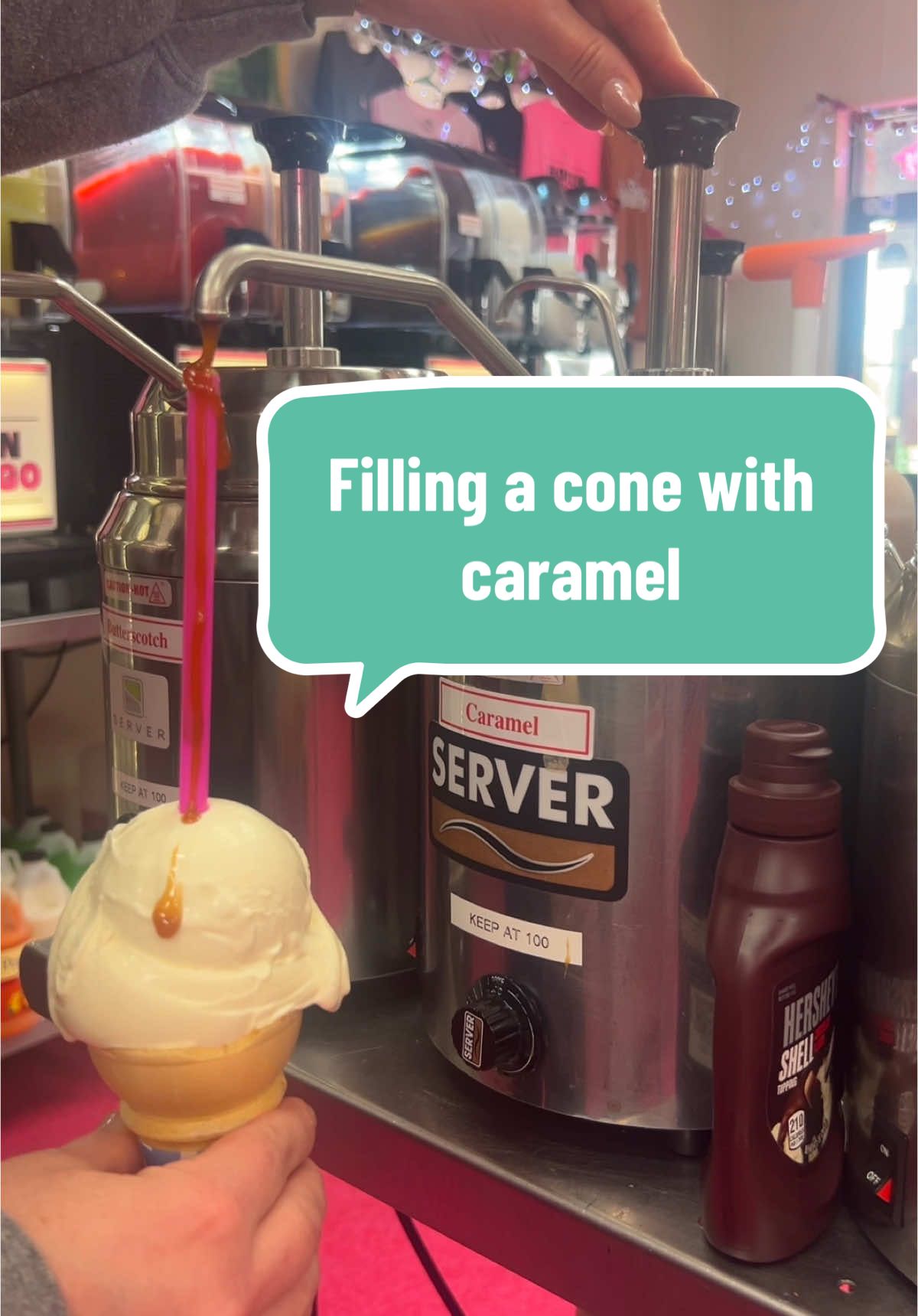 Filling a cone with caramel #fyp #SmallBusiness #businessowner #dayinmylife #frozenflamingo #frozencustard #work 