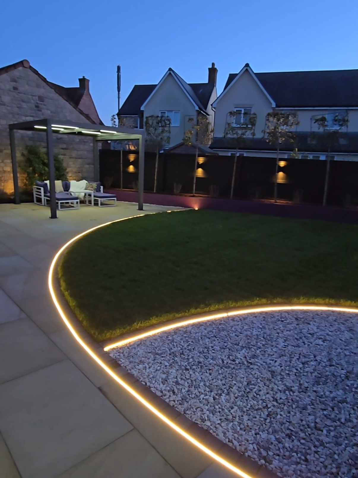 ✨ Stunning Garden Transformation with Orko Curve Lighting! ✨ This might just be one of our most breathtaking project yet! 🌿💡 A seamless blend of curved patio design and elegant LED lighting, creating a mesmerizing glow that enhances every detail of this outdoor oasis. The Orko Curve lighting follows the natural flow of the garden, bringing a modern, ambient touch that transforms this space into something truly magical. #patio #lighting #landscaping #dewalttools 