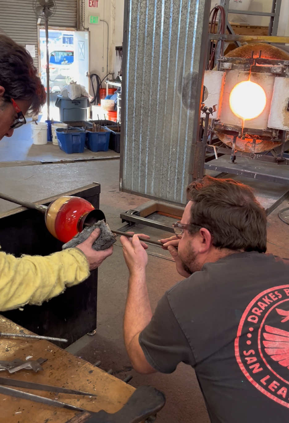 Glass Blowing a small light fixture. #slowburnglass #glassblowing #glassblower #glassblowersoftiktok #glasstok #art #artist #artistsoftiktok #glass #hotglass #hotshop #glasswork 