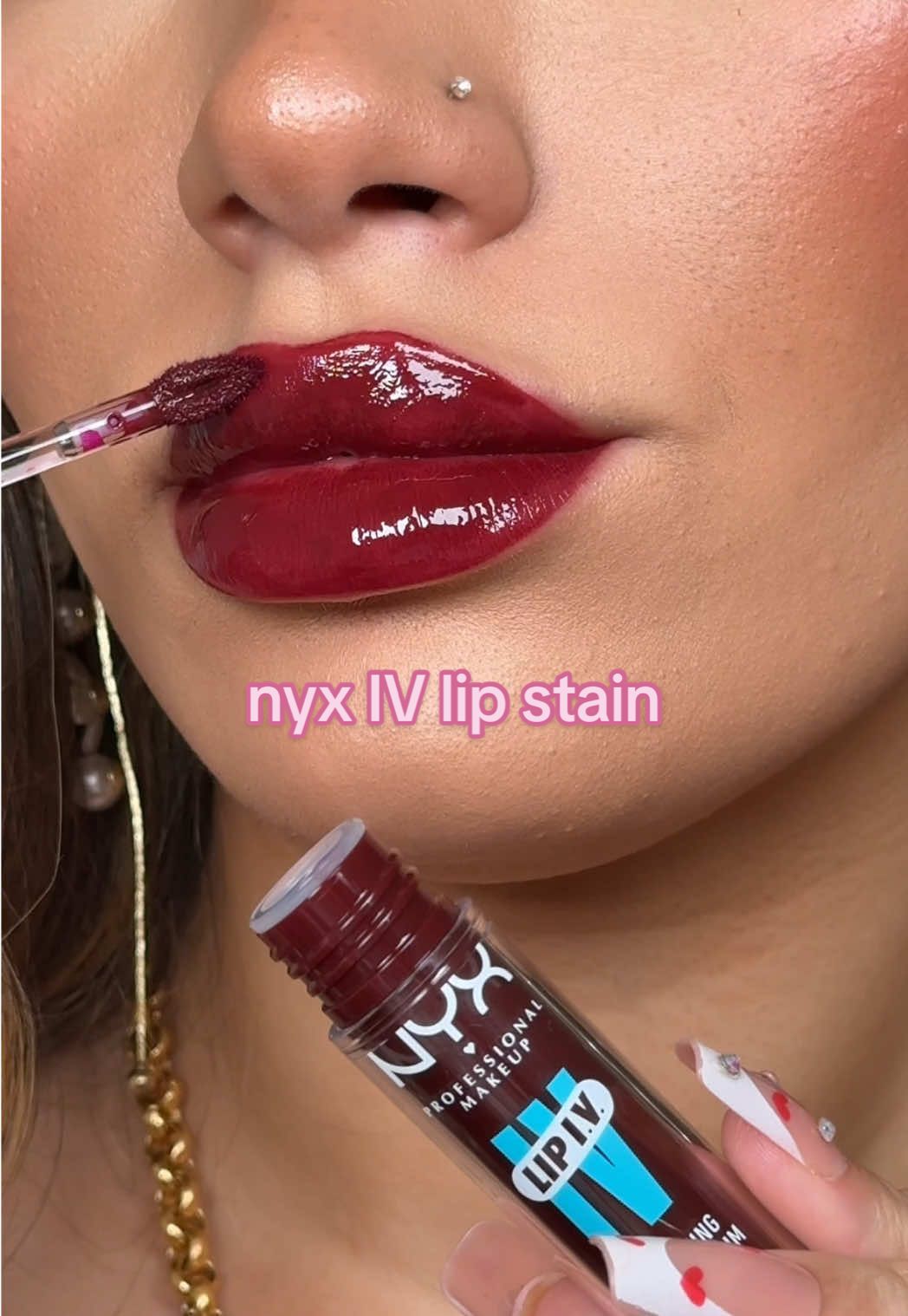 this shade of the viral nyx cosmetics lip iv hydrating gloss lip stain is my favourite for the incredible tint it leaves 🩷 if that’s not my perfect lip colour i don’t know what is 💋 it’s so long lasting that it stays all day too!  this one is the shade ‘water bout wine’ 🍷 @NYX Professional Makeup @nyxcosmetics_uk  #nyxcosmetics #nyxlipiv #lipstain #virallipstain #liptint #liptintviral #longlastinglipstick #glossylips #lipswatch #lips #liptutorial #lipglossswatch 