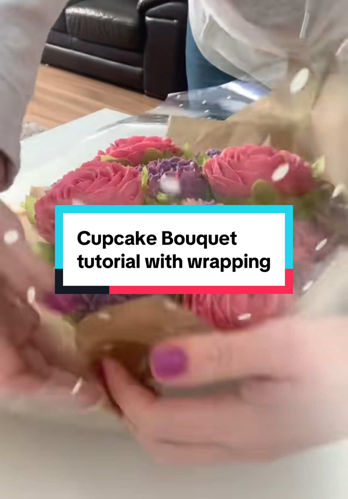 Pink and purple cupcake bouquet.  Watch me insert the cupcakes and give a tutorial on how to wrap it.  These are my absolute favourite to make.  Let me know if there are any flowers you would like a tutorial on so I can help you 🤩 #cupcakebouquet #pinkflowers #cupcake #debbiebakes #cupcakeoftheday #learncake #caketok #buttercreamrose #buttercreamflower #cupcakeflower  