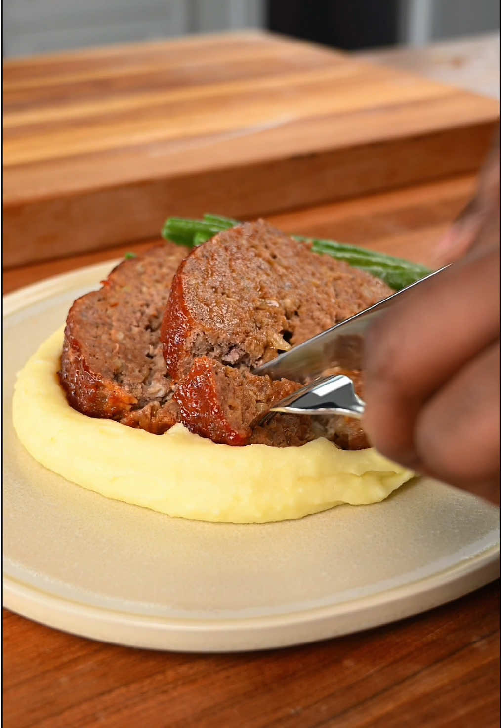 Meatloaf!!  This was delicious!! Who would have guessed that the milk in meatloaf is the real star of the show. Moist, juicy and flavourful, this one is definitely a crowd pleaser that I’ll be making again. Try it for yourself and let me know what you think!  Recipe; Ingredients 2 lbs Ground beef 1 tablespoon Ontario butter 1 large white Onion diced  3 cloves Garlic minced  1 cup Ontario Milk 1 cup Breadcrumbs  1 tablespoon All-purpose seasoning 1 tablespoon Italian seasoning 1 tablespoon Worcestershire sauce ¼ cup Ketchup  2 teaspoons Chili flakes 2 eggs  1 tablespoon Salt  2 teaspoons black Pepper Glaze ½ cup Brown sugar ¾ cup Ketchup 1 tablespoon Onion powder 1 tablespoon Garlic powder ¼ cup White vinegar  Using a whisk mix all ingredients together until fully combined and smooth.  Method; In a medium sized sauté pan add one tablespoon of butter and sweat your onions and garlic until fully cooked. Approximately 3 minutes. Set aside and allow to cool to room temperature. In a small bowl combine breadcrumbs and milk and mix together.  In a large bowl add your ground beef, eggs, breadcrumb milk mixture, cooked garlic and onions as well as all other ingredients listed. Mix well until fully combined. In a 8x4 loaf pan, add your meat evenly and make sure it’s packed down.  Place loaf pan on a oven tray and bake the meatloaf on the middle rack in a preheated oven of 350f for 45 minutes Once initial bake is done, pour glaze over meatloaf and continue to cook for another 15-20 minutes.  Remove from oven and allow to cool for 10 minutes before slicing and serving.  #inspiredbydairy #EasyRecipes @Ontario Dairy 