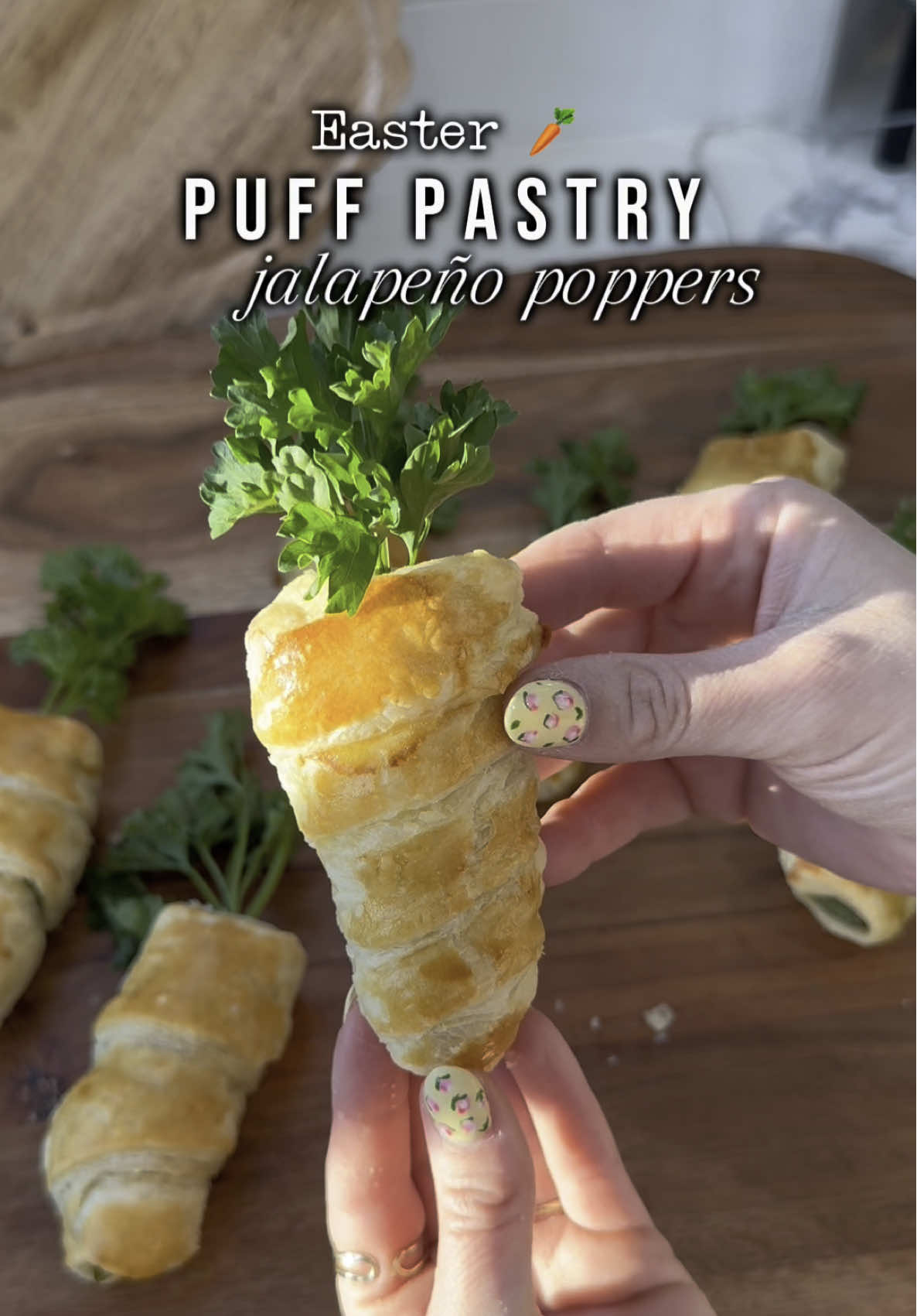 Puff pastry jalapeño popppers, EASTER edition 🤤 SO good!  	1.	Preheat your oven to 400°F. 	2.	In a bowl, combine 8 oz of cream cheese, ¾ cup of Colby Jack cheese, ¼ cup of freshly chopped chives, ¼ cup of freshly chopped parsley, ½ teaspoon of garlic powder, and a pinch of salt. Fill the jalapeño halves with this mixture. 	3.	Slice the puff pastry into thin strips and wrap them around the stuffed jalapeños. 	4.	Whisk an egg with a splash of milk or water, then brush it over the wrapped jalapeños. 	5.	Bake for 20 minutes until golden brown. 6. Add parsley to the ends to finish the look #easter #easterrecipes #EasyRecipes #momhack #foodhacks 