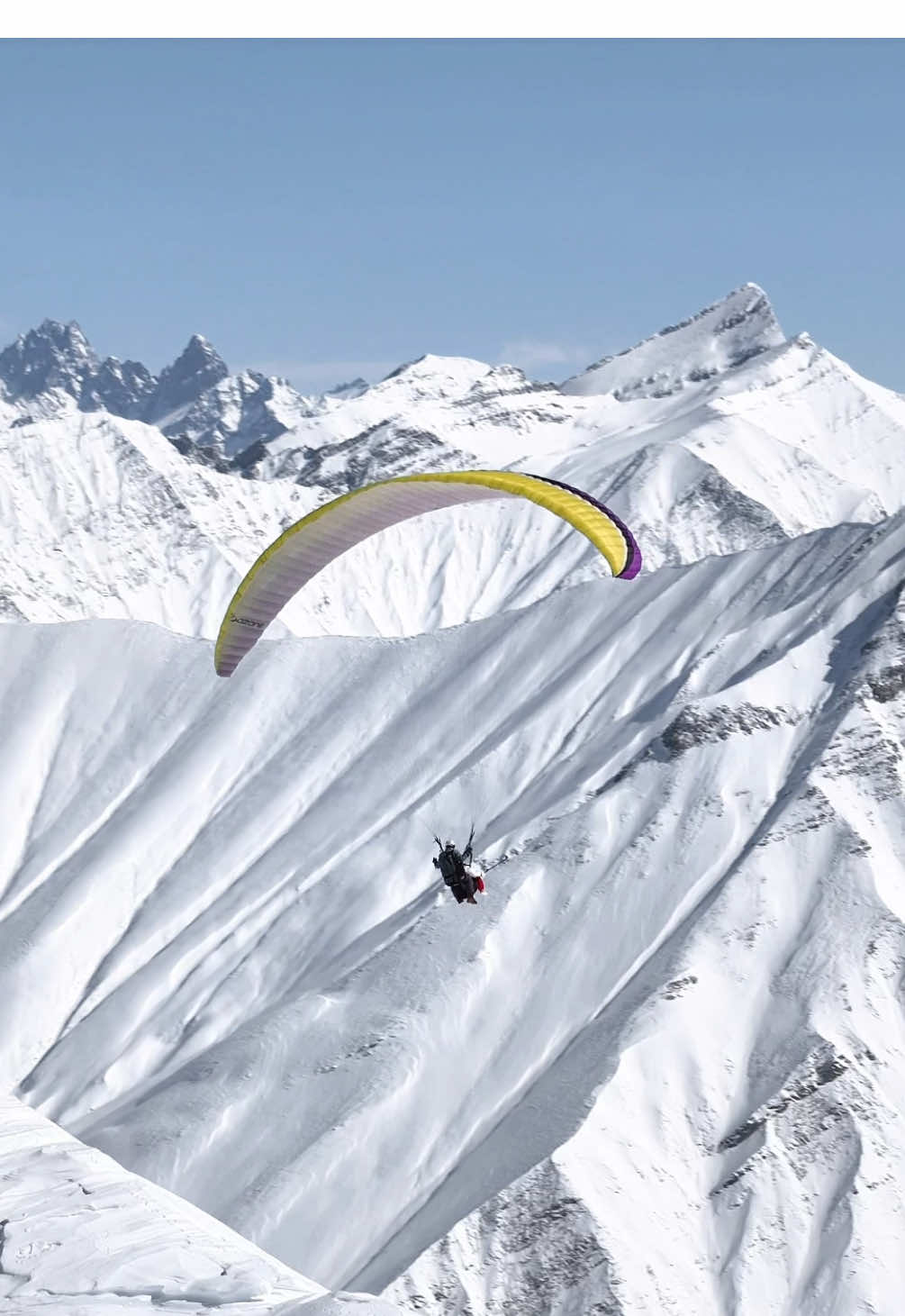 Stunning view🏔️🪂 Paragliding in Gudauri (Georgia) • now is a very good time to fly and there is a lot of snow🔥 Friends, if you want to visit beautiful Gudauri and fly a paraglider or snowmobile, and also make exclusive videos with a drone - then write to me in private messages, I willi organize everything for you🫶 • @Roman Tsindeliani 🪂🔥 #georgia #paragliding #winter #drone #world #gudauri #tbilisi #sport #beautiful #mountains #traveling #china #corea #kazahstan #arab 