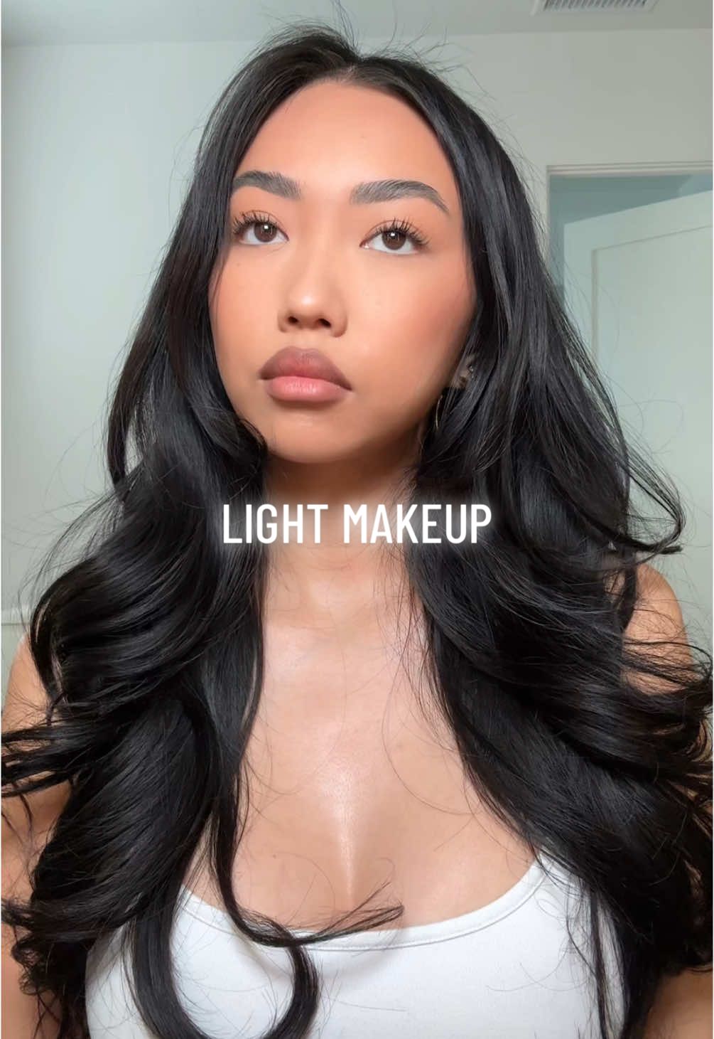 my definition of light makeup.. i rather have no makeup on than anything light coverage. so i prefer medium coverage products (that you can sheer out too)  @Rare Beauty brow gel @rhode skin barrier butter @e.l.f. Cosmetics power grip @milkmakeup skin tint (8) @Saie dew bronze (spritz) @Tower 28 Beauty concealer (mdr), blush (long beach iced tea) @Patrick Ta Beauty blush (she’s flushed) @Huda Beauty easy bake (cupcake) @Fenty Beauty bronzer (private island) @innae beauty mascara @Josie Maran body butter (tangerine) #skincare #makeup #makeupskincare #dryskin #lightmakeup #makeup #makeuptok #sensitiveskin #acneproneskin 