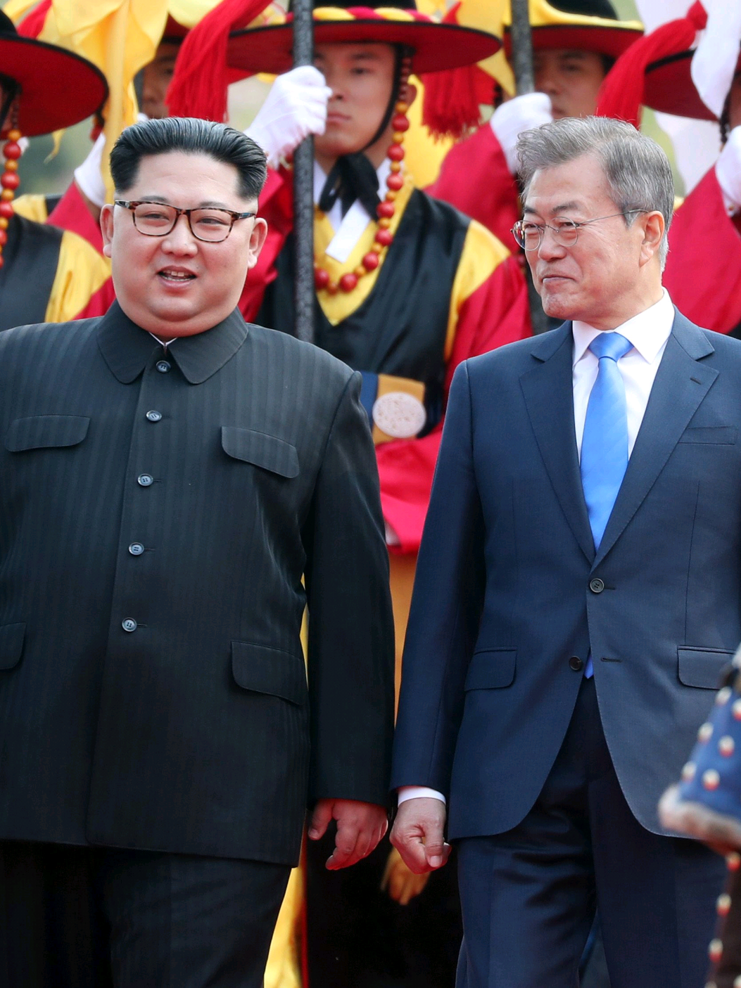 On April 27, 2018, a summit meeting between the leaders of the Democratic People's Republic of Korea (DPRK) and the Republic of Korea (ROK) took place.   At 9:30 local time, Kim Jong-un, the Supreme Leader of the DPRK, crossed the military demarcation line from Panmunjom into the ROK side. Moon Jae-in greeted him at the military demarcation line. Later, at the invitation of Kim Jong-un, the two leaders walked hand in hand back to the DPRK side, stayed there for a while and then returned to the ROK side. Escorted by the traditional honor guards, the two leaders walked on foot from the military demarcation line to the Panmunjom Square located between the 