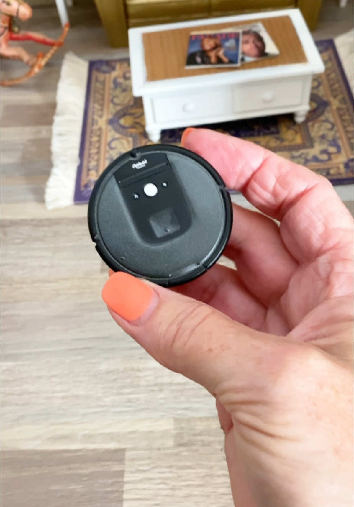 This is my mini iRobot Roomba gashapon collectible from Japan! Made in 2019, this cute miniature perfectly captures the look of the real Roomba robot vacuum. Watch as I demonstrate how this tiny collector's item looks in my Barbie size living room setting! #MiniRoomba #Gashapon #JapaneseCollectibles #tinythings #grandmagetsreal #barbiesize  #dailymini #irobot #roomba 