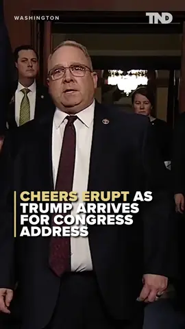 President Donald Trump greeted by cheers and 