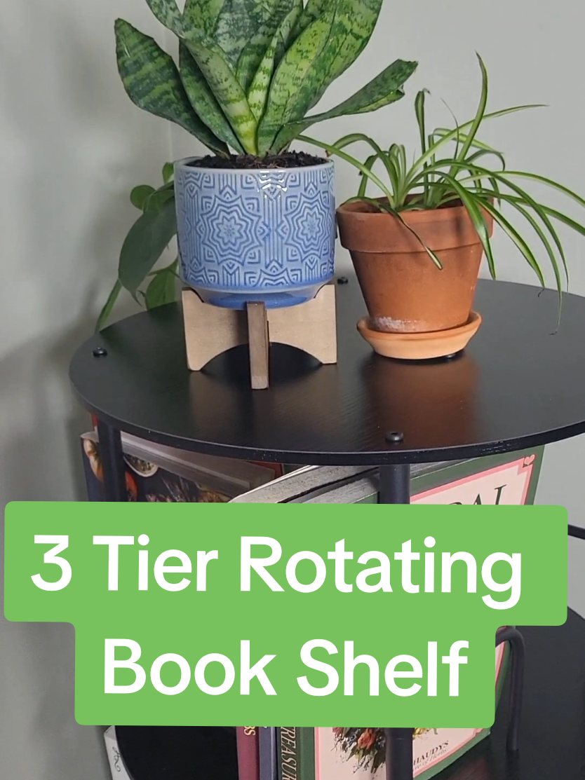 This rotating bookshelf is such a beautiful addition to our spare bedroom and a great place to store all of my gardening, recipe and diy books! #rotatingbookshelf #bookshelf #BookTok #bookstorage #bookorganization 