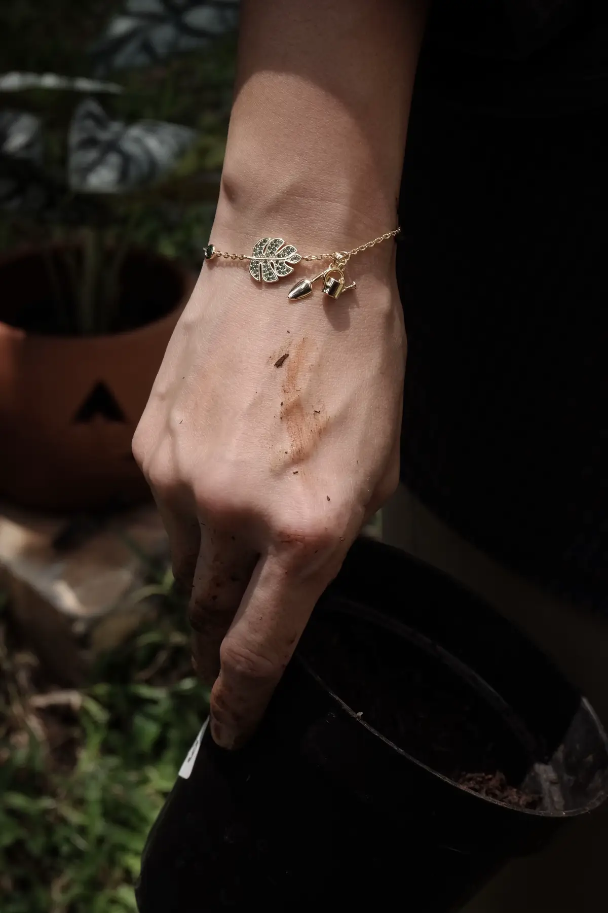 Jewelry that grows with you! Watch our Monstera bracelet shine as it gets its hands dirty—because beauty belongs in nature. Water, soil, and charm all in one.   #GardenJewelry #NatureInspired #MonsteraLover #GoldJewelry #CharmBracelet #JewelryWithMeaning #GardeningLife #PlantLover #GreenThumb #SustainableStyle #EcoChic