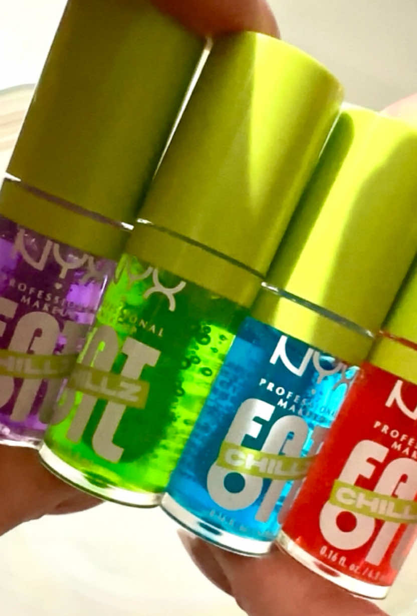 ✨🩷🩵💚💜 Refreshing Sheer Neon Lip Oils!  I received these free from Influenster and NYX in exchange for my honest review. I’ve been trying out the Neon Lip Oils, aren’t they eye-catching! Gives me lots of neon vibes, oh so nostalgic! The shades are vibrant in packaging but sheer when applied, and the scent is slightly fruity sweet—not overwhelming, just fresh. The best part? The minty cooling sensation is so refreshing! The Chillz Freezies gives a burst of hydration without the sting of plumping formulas. It’s thick but not icky sticky, leaving your lips with a glossy, high-shine finish that lasts. Plus, the nourishing oils keep my lips feeling soft. What I love most is how it enhances my natural lip color with a SUPER glossy effect—no burning just a nice, cooling feel. If you’re looking for something that feels as good as it looks, these lip oils are definitely worth trying! - Hydrating and  moisturizing 💧 - High-shine, slightest stickiness  ✨ - Refreshing cooling sensation 🌟 💖 I think these are a big hit, my teen would buy the entire collection in the store immediately!  Overall, these lip oils strike the perfect balance between hydration and gloss. Highly recommend giving them a try! #NYX #LipCare #lippies #neon @influenster @nyxcosmetics #complimentary #nyxcosmetics 