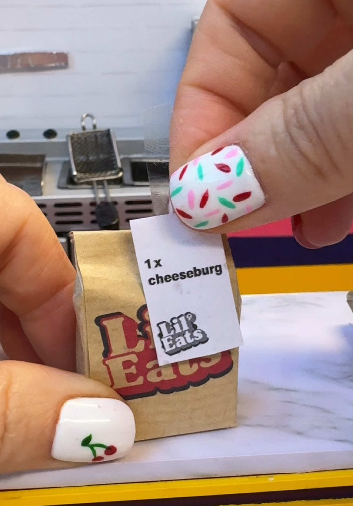 The tiniest Cheeseburger in the Mini Bakes kitchen! What’s on your burger? #burger #cheeseburger  #minicooking 