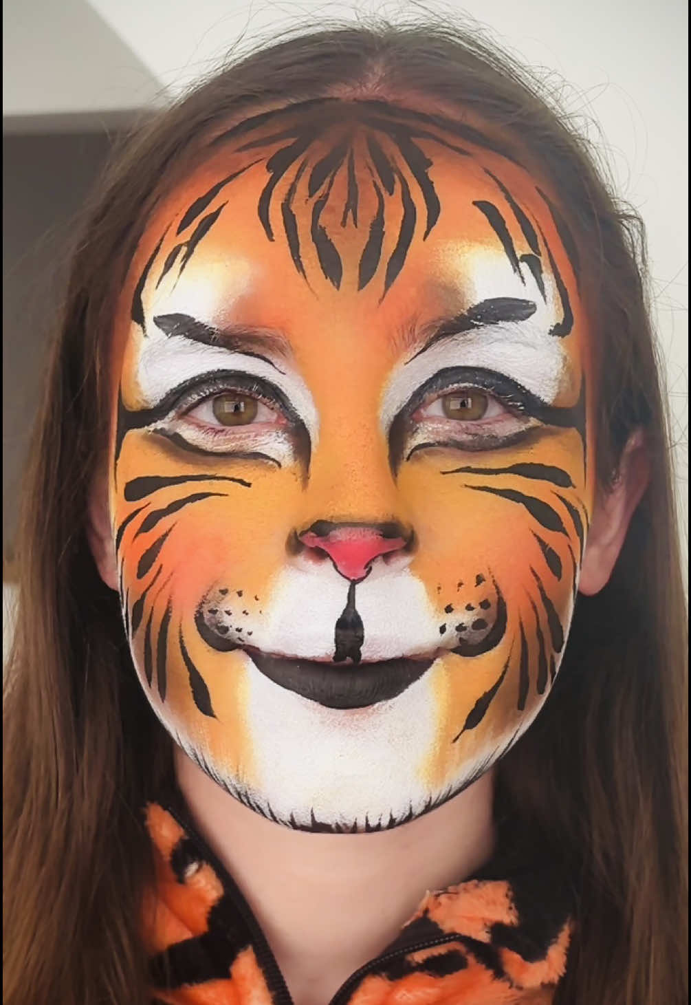 Turning my daughter  @AJ🫧 into #thetigerthatcametotea this morning because she didn’t organise a costume…. A random tiger onsie and ignoring her wishes completely made this look happen 😂😂😂😂😂  using @evolveorganicbeauty and @Mehron Makeup #worldbookday  #londonmua #londonfaceandbodypaint #mualondon