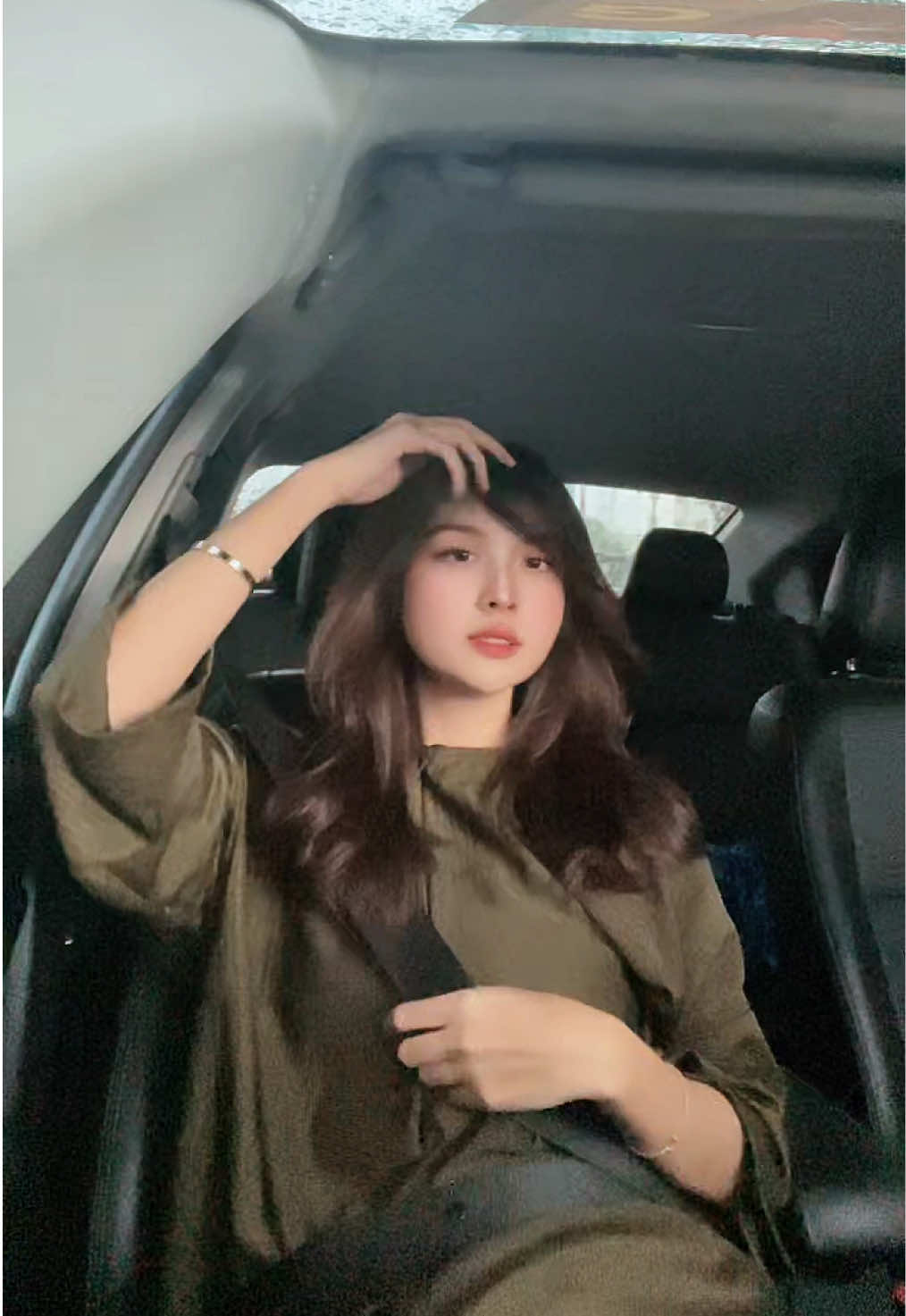 Me in the car, waiting for my favorite apam beras from the bazaar because I don’t wanna get my fluffy hair all wet