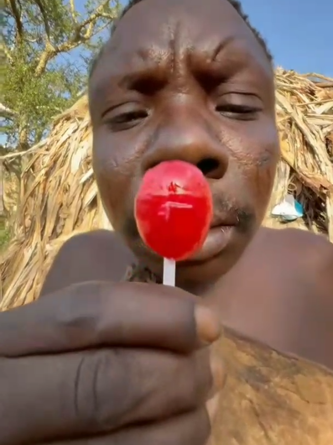 Hadzabe Tribe bushmen Chabba tries this new thing for the first time, it is not something typical in his traditional lifest. #africa #hadzabe #hadzabetribe 