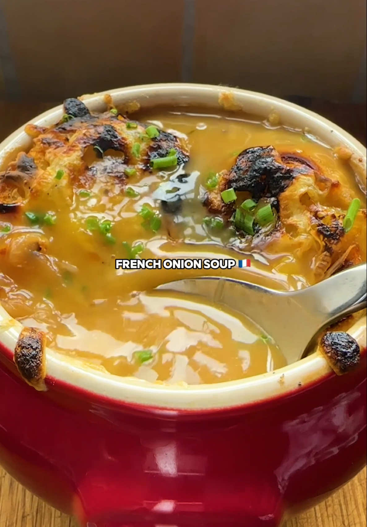 FRENCH ONION SOUP 🇫🇷 SOUP SUNDAYS 🧅 you can’t beat a classic french onion soup on a Sunday. warming, comforting, packed with flavour & actually really easy to make at home yourself 👨🏻‍🍳 so here’s my version - hope you enjoy! let me know what soup you want to see next Sunday in the comments below 👇  INGREDIENTS (serves 4) 1 kg onions 5 garlic cloves 1 tbsp butter 2 tbsp plain flour 250 ml white wine 1.5 litres vegetable stock 1 tbsp sugar Handful of fresh thyme Handful of fresh rosemary 2 bay leaves 1 baguette 200g cheese of choice 15g fresh chives Salt, pepper + olive oil METHOD 1. Slice the onions, then add the butter + oil in a deep-bottomed pan.  2. Add the onions, season with salt, mix well + sautée on a medium heat until softened (15-20 minutes - stirring regularly to avoid burning).  3. Add the sugar, then cook for a further 10-20 minutes until golden + soft.  4. Mince the garlic + sautée until fragrant.  5. Add the plain flour, stir well until incorporated Increase the heat, then add the wine gradually to deglaze the pan, stirring well as you go.  6. Add the hot vegetable stock, rosemary, thyme + bay, then simmer for 30 minutes.  7. Slice the baguette + toast under the grill with a splash of oil / in toaster.  8. Ladle the soup into heatproof bowls, put the bread on top, then cover with grated cheese. Place under the grill until melted, then top with finely chopped chives + enjoy! #frenchonionsoup #soup #souprecipe #EasyRecipe #comfortfood 