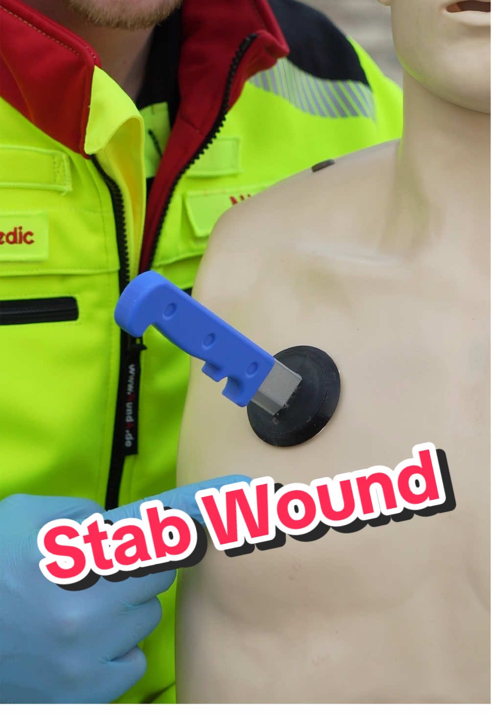 First Aid on a Stab Wound 🚑🔪 If someone has been stabbed and the knife is still in place, 𝗗𝗢 𝗡𝗢𝗧 𝗥𝗘𝗠𝗢𝗩𝗘 𝗜𝗧! Pulling it out could cause severe bleeding and more damage. Instead, follow this method to stabilize the wound until help arrives: 1️⃣ Take a SAM splint and cut a piece about 25 cm (10 inches) long. 2️⃣ Cover the sharp edges with duct tape for safety. 3️⃣ Cut along the long edge every inch (to the middle), fold the flaps upward, and roll it into a circular shape. 4️⃣ Place this stabilizing ring over the knife and secure it with duct tape to keep it from moving. This prevents unnecessary movement and buys time for emergency care. 🚑 Always call emergency services immediately! 🦺 Clothing by Niemöller & Abel //Anzeige #ambulance #paramedic #emergency #firstaid #hospital #nurse