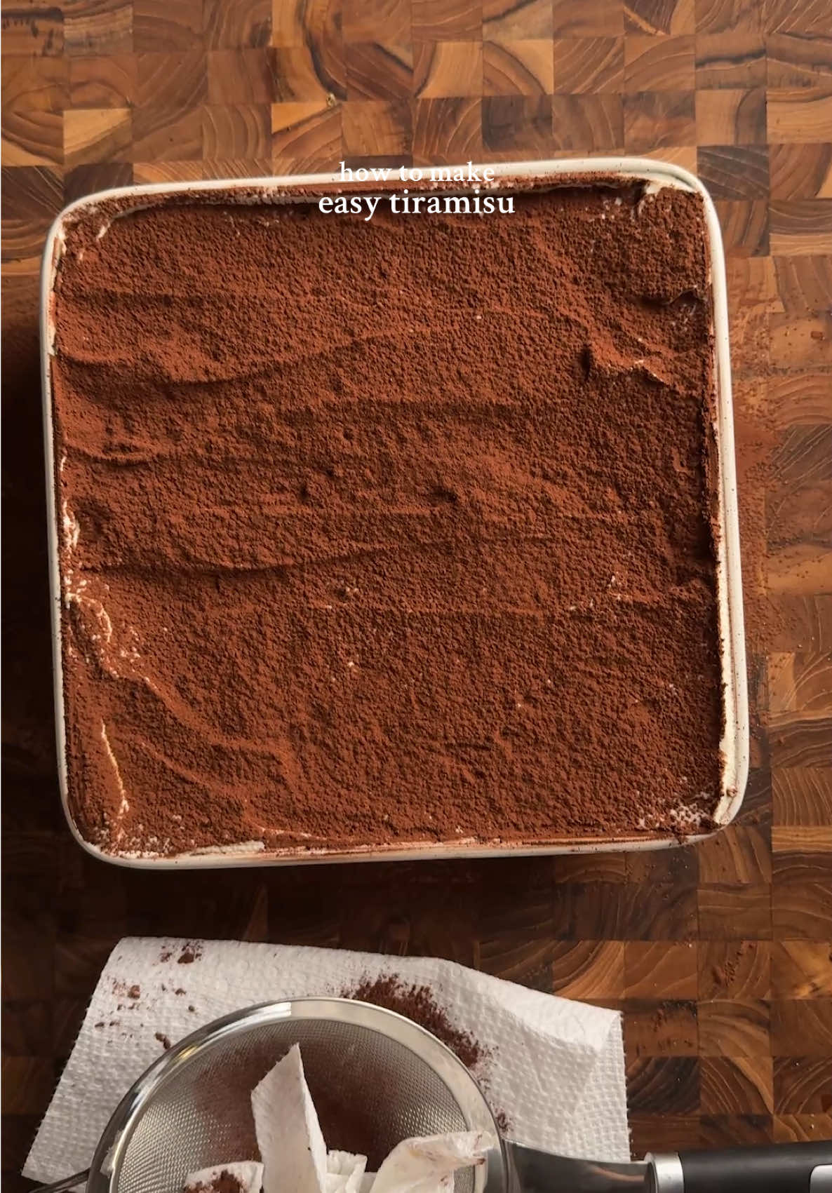 Easy Tiramisu! 1 1/2 cup (180g) heavy or whipping cream 8oz (225g) mascarpone 1/3 cup (65g) sugar 2 tsp (2g) vanilla 1 1/2 cups espresso (6 tbsp espresso powder in 1 1/2 cups hot water) 2 packages of lady fingers cocoa powder for dusting mix mascarpone and cream. once combined add in sugar and vanilla. whip until you have soft peaks. to assemble, dip the lady fingers quickly in the hot espresso and layer on the bottom of a pan. I used a 9x9 pan for this. then half of the cream layer, then more dipped ladyfingers, and then the rest of the cream mixture. dust with cocoa powder and leave in the fridge for a couple hours (or eat right away if ur like me lol) #tiramisu #Recipe #baking #baketok recipe ib: tastesbetterfromscratch 