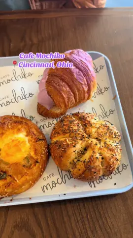Holy 🥐🥐🥐  We went to Cincinnati to celebrate my birthday last weekend🎂 and Cafe Mochiko knocked our socks off 🔥💜💜💜  In the video we have a 👇 🍳Kimchi & Egg Croissant  🥯Everything Cream Cheese Bao 🍠Ube Halaya Croissant Aaaaand the Ube Halaya croissant was probably the best “sweet” pastry we’ve EVER had 🤯 but it’s actually not super sweet at all! The filling was IIIINNNNCREDIBLEEEE.  Cafe Mochiko is also known for their creative Cincinnati chili ramen and have a delicious sounding dinner menu 🔥 #cincinnati #ohiobakery #ube #croissants #cincy #cincinnatifood #Foodie #food #pastries #japanesefood 