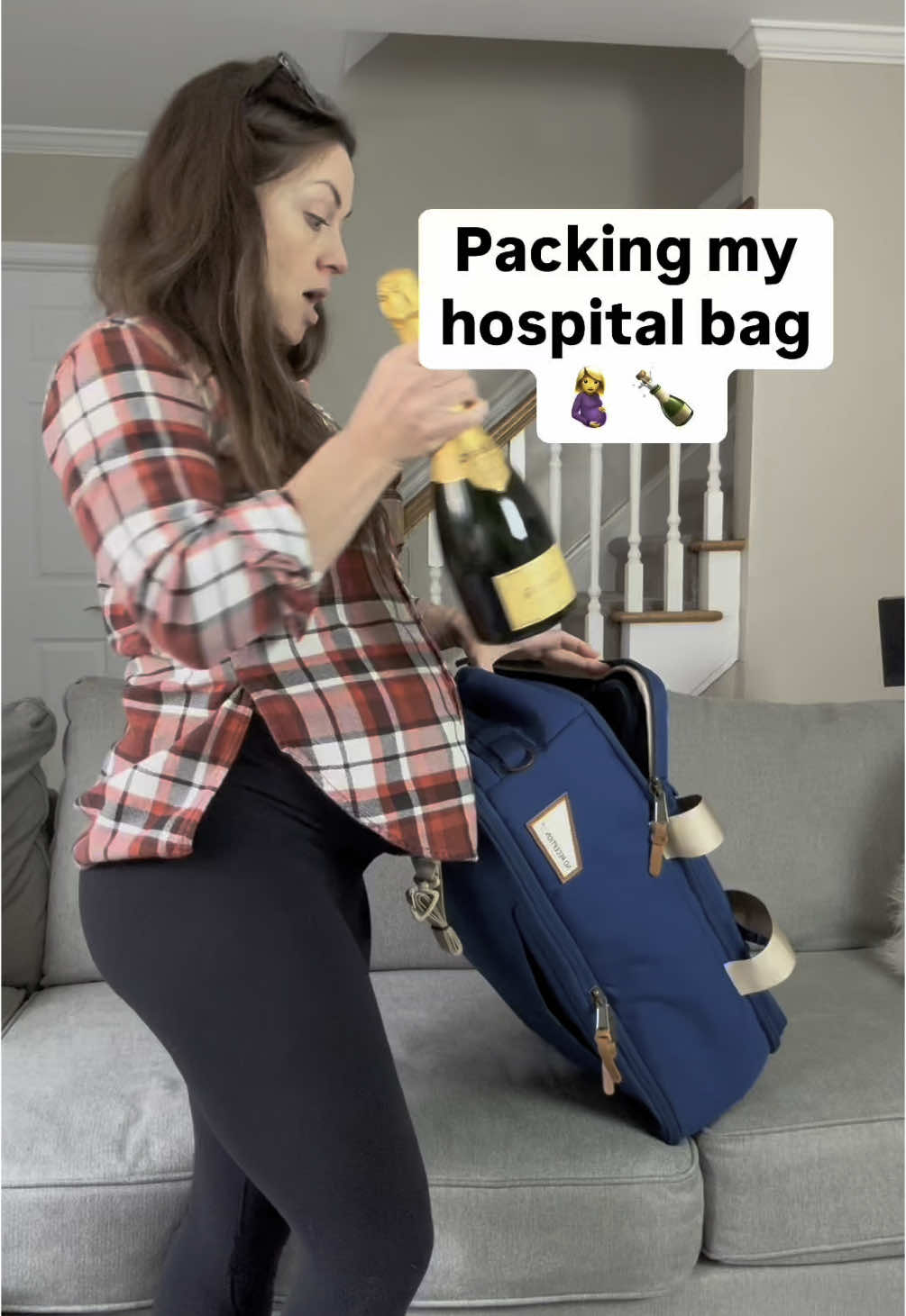 Packing only the essentials the second time around 😎 🍾  #pregnancyjourney #pregnancyhumor #momjokes #hospitalbag #krug #thirdtrimester 