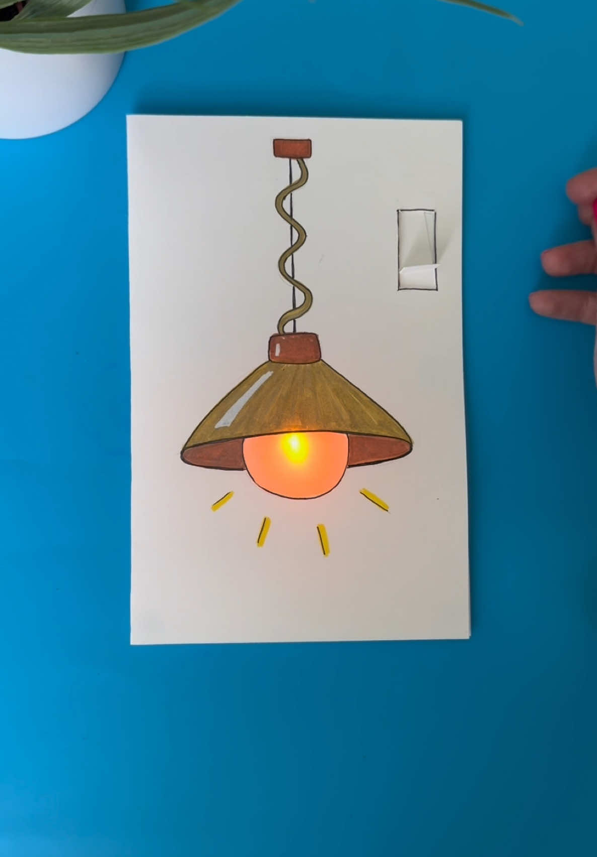 DIY “Lamp with a switch” interactive light-up card. Easy and fun paper circuit project for beginners.  You will need: - LED diode - Conductive copper tape - Coin cell battery 3V (CR2032) - Paper - Tracing paper - Markers Warning: this project should be done under adult supervision. ©️ @Moonshotkidz – All rights reserved. Reproduction, distribution, or use of this artwork and video without permission is prohibited. For licensing inquiries, contact Moonshotkidz@gmail.com Order supplies here: https://www.amazon.com/shop/moonshotkidz #art #STEAM #papercraft 