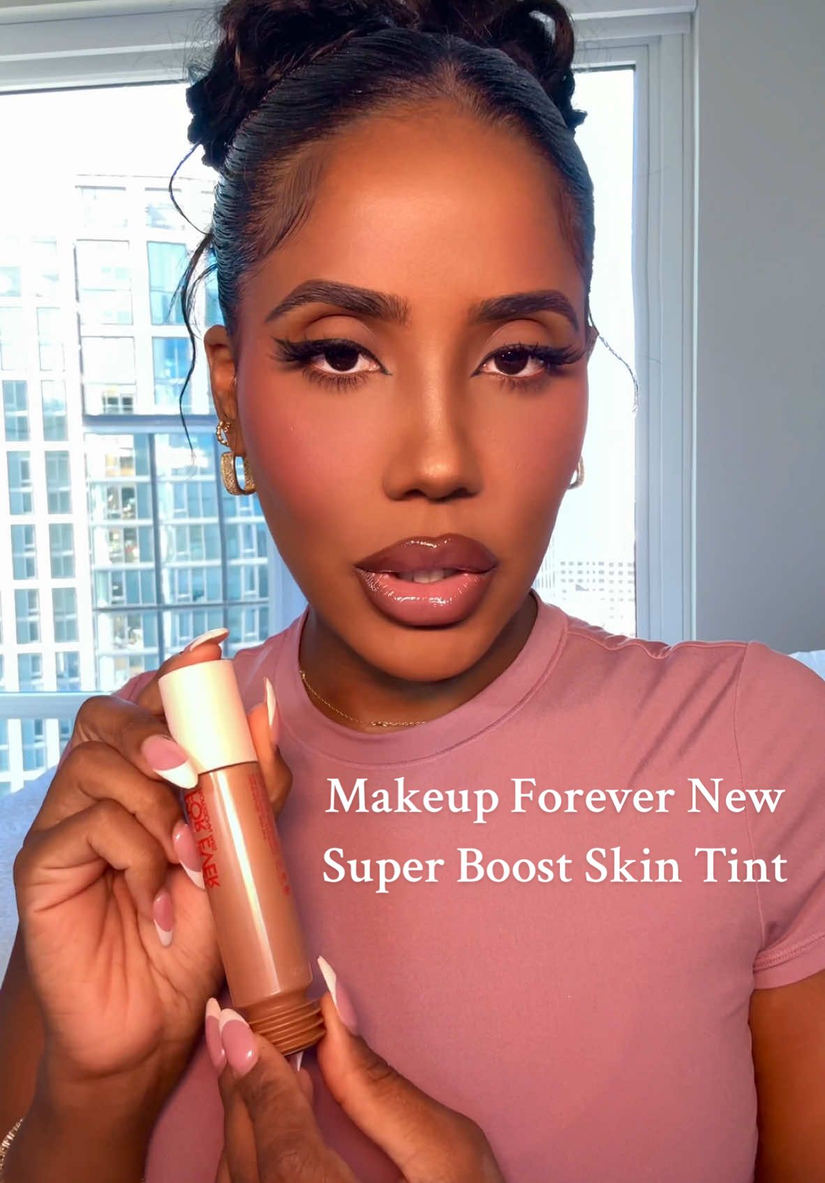 Let’s review the new @makeupforever Super Boost Skin Tint + Gloss! Products Face: @Makeupforever Super Boost Skin Tint #11 Concealer: @LYS Beauty Triple Fix full coverage Brows: @Benefit Cosmetics Precisely my brow # 5 Blush: @HNB Cosmetics Glossy Skin blush # 3 Powder: @Huda Beauty Ube birthday cake  Powder blush: @KimChi Chic Beauty # 4 cheeky  Liner: @benefitcosmetics They’re Real Xtreme precision liner  Face glow: @DanessaMyricksBeauty yummy skin glow serum in Main Squeeze  Mascara: @elfcosmetics Lash Xtender Lipliner: @makeupforever Limitless brown Gloss: @makeupforever Anywhere Caffeine + the cream blush from the cheeks on the center  @shoptuhlz1 Abstract Sponge