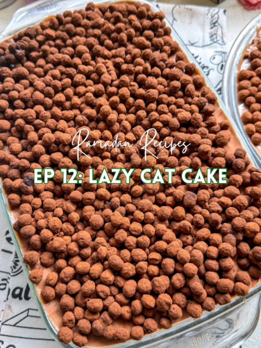 Viral Lazy Cat Cake Chocolate Cake 200 g sugar 105 g all-purpose flour 32 g cocoa powder 1 teaspoon baking soda 1/2 tsp baking powder 1/2 teaspoon salt 1 egg 120 ml buttermilk 120 ml strong black coffee 60 ml oil 1 teaspoon vanilla extract Chocolate milk as required - Mix all the dry ingredients in a bowl and all the wet ingredients in another bowl - Add the wet ingredients to the dry ingredients and beat well. The batter will be runny - Transfer to your greased dish and bake in the pretreated oven for 30 to 35 minutes till a skewer inserted in the center comes out clean - Let the cake cool then poke holes in it and soak with chocolate milk. Refrigerate Cream Cheese Filling 250 g cream cheese 1/2 cup condensed milk 175 g whipping cream (I used Whippy Whip) - Beat the cream cheese till smooth then add in the remaining ingredients and beat till fluffy but not stiff Spread evenly over the cake and refrigerate for 1 hour.  Chocolate Ganache 100 g cream (room temperature) 100 g milk chocolate (room temperature) 1 tbsp milk - Melt everything in the microwave for 30 seconds till smooth. Do not over heat Spread over the cooled cake and refrigerate till serving Crispy Choco Balls 100 g chocolate balls cereal 85 g melted chocolate (milk or dark) 3 tbsp cocoa powder mix the cereal with the chocolate Add the cocoa powder, seal the bowl and shake well - Spread over the cake and serve cold.  #viralshorts #viralcakevideo #lazycat #cake #cakerecipes #EasyRecipe #lazycat #cake #chocolatecake #viralvideos #cakerecipe #foodies #fyp 