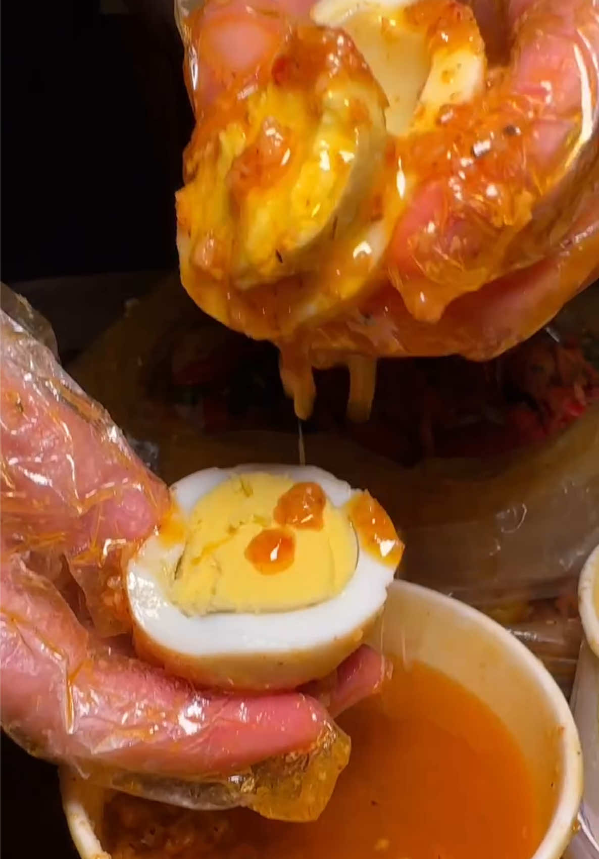 What are you dipping in our house special sauce? 🤔 #theboil #cajunseafood #cajuntiktok #cajunfood #seafoodboil #snowcrab #crablegs #egg 