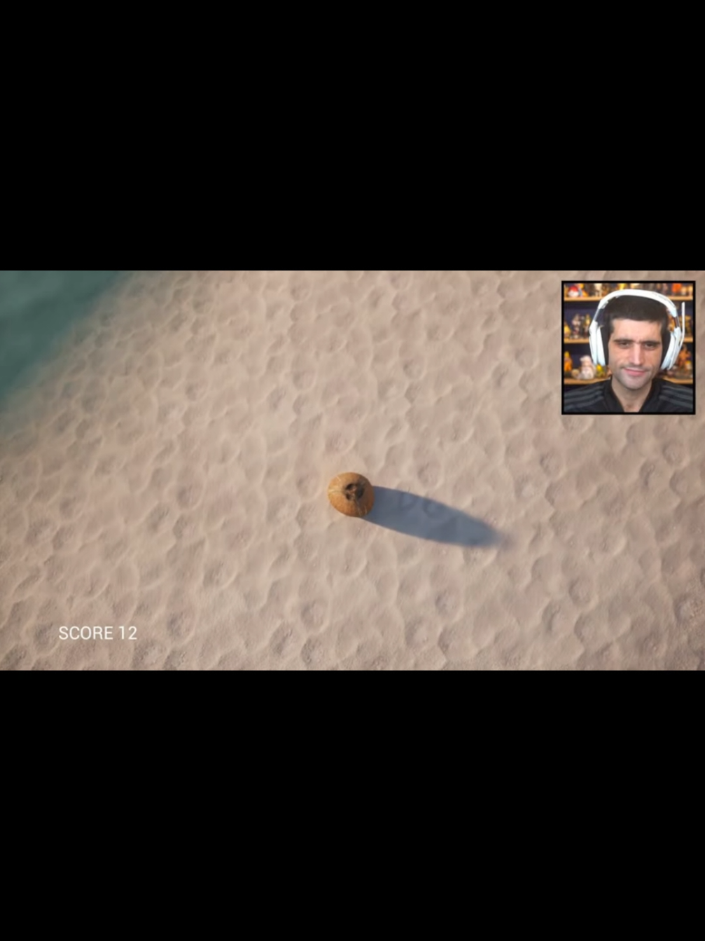 Davy Jones jogando o simulador de coco 