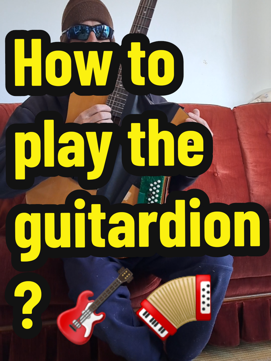 Still trying to figure out  how to play it . Any ideas ? 🤣 #guitar  #accordion  #hybrid #music