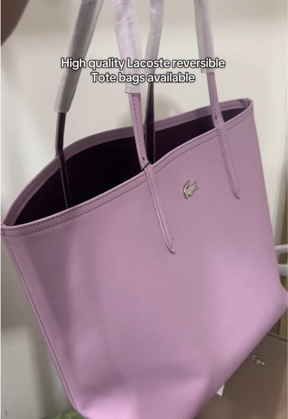 Available for immediate purchase 🫣🎀.  #lolagotya #lolagotyahere #personalshopperfinds #personalshopper #smallstreetrunner #lacostetotebag #lacostereversibletotebag 