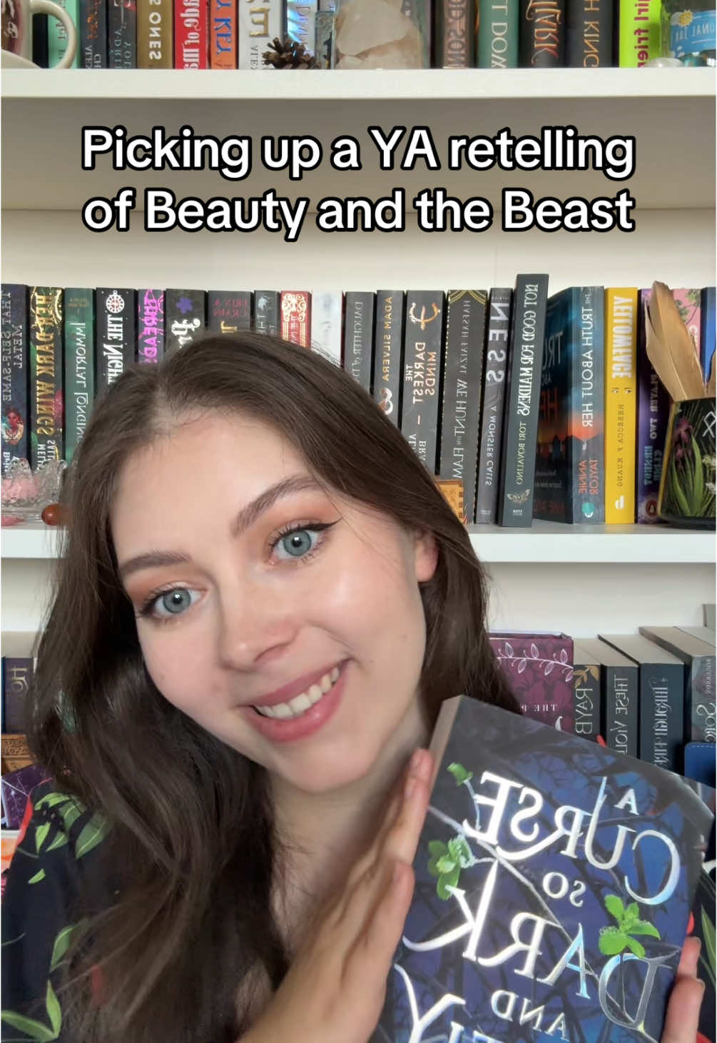 A Curse So Dark and Lonely by Brigid Kemmerer  The plot twist at the end of this book had me GASPING! Such a good twist on the classic Beauty and the Beast storyline. This is the first book in the trilogy and I highly recommend it! 🥀  Fall in love, break the curse. Cursed by a powerful enchantress to repeat the autumn of his eighteenth year, Prince Rhen, the heir of Emberfall, thought he could be saved easily if a girl fell for him. But that was before he turned into a vicious beast hell-bent on destruction. Before he destroyed his castle, his family, and every last shred of hope.  Nothing has ever been easy for Harper. With her father long gone, her mother dying, and her brother constantly underestimating her because of her cerebral palsy, Harper learned to be tough enough to survive. When she tries to save a stranger on the streets of Washington, DC, she's pulled into a magical world. Break the curse, save the kingdom. Harper doesn't know where she is or what to believe. A prince? A curse? A monster? As she spends time with Rhen in this enchanted land, she begins to understand what's at stake. And as Rhen realizes Harper is not just another girl to charm, his hope comes flooding back. But powerful forces are standing against Emberfall ... and it will take more than a broken curse to save Harper, Rhen, and his people from utter ruin. #beautyandthebeast #bookretelling #fairytaleretellings #yabookrecs #acursesodarkandlonely 