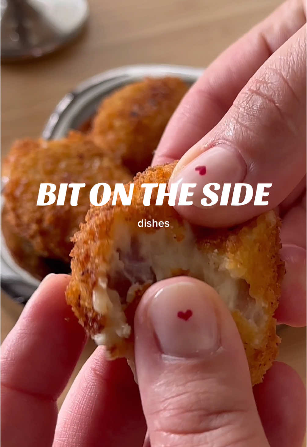 BIT ON THE SIDE ep 15 - prosciutto and almond croquetas / croquettes! This is my take on the wildly popular Spanish tapas dish and are so addictive I implore you not to eat all of them! I often stick to a more traditional Serrano ham filling but I just love this prosciutto and almond combo - sounds weird but I promise it’s elite. The trickiest part of this dish is shaping them, I find using a spoon to measure out the béchamel dropping it straight into the flour helps. PS I’m not sure why I went from croquetas to croquettes in my VO but I only noticed when editing and I cba to re-record it so… give me some grace 😂 Enjoy!!  Makes 18-20  40ml olive oil  60g flour  400ml whole milk  90g young manchego Fresh nutmeg  Salt  White pepper  200g prosciutto, cut into small pieces 30g blanched almonds, roughly chopped  75g flour 2 eggs  75g breadcrumbs  Neutral oil for frying (you can also use olive oil but in this economy!! I don’t think so)  Full recipe linked in my bio x  #fyp #croquetas #croquettes #bitontheside #tapas